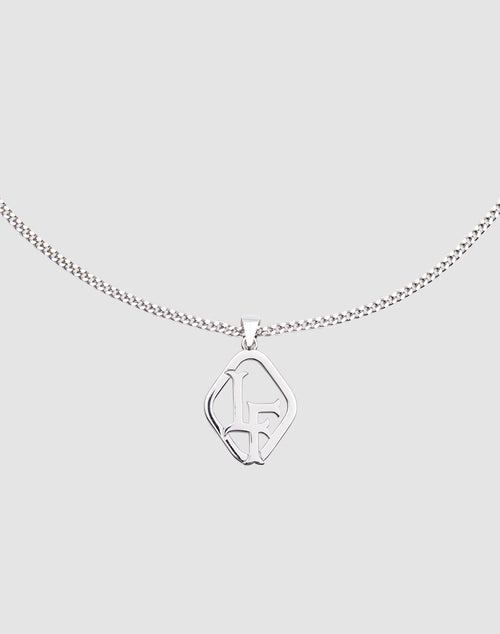The LF Blank Chain by LIVE FAST DIE YOUNG is a 925 Sterling Silver necklace with a delicate, adjustable chain and a geometric pendant featuring intertwined L and F letters, shown on a plain light gray background.