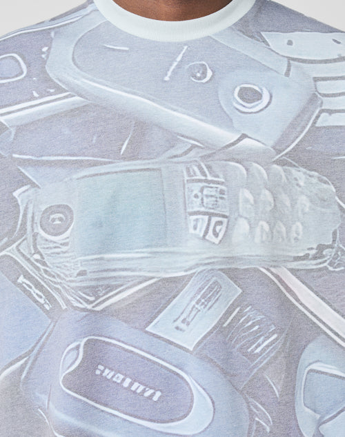 A close-up of the LFDY Stolen Phones Longsleeve by LIVE FAST DIE YOUNG, featuring a printed design of overlapping vintage mobile phones that highlights the shirt’s fabric details and captures a retro vibe.