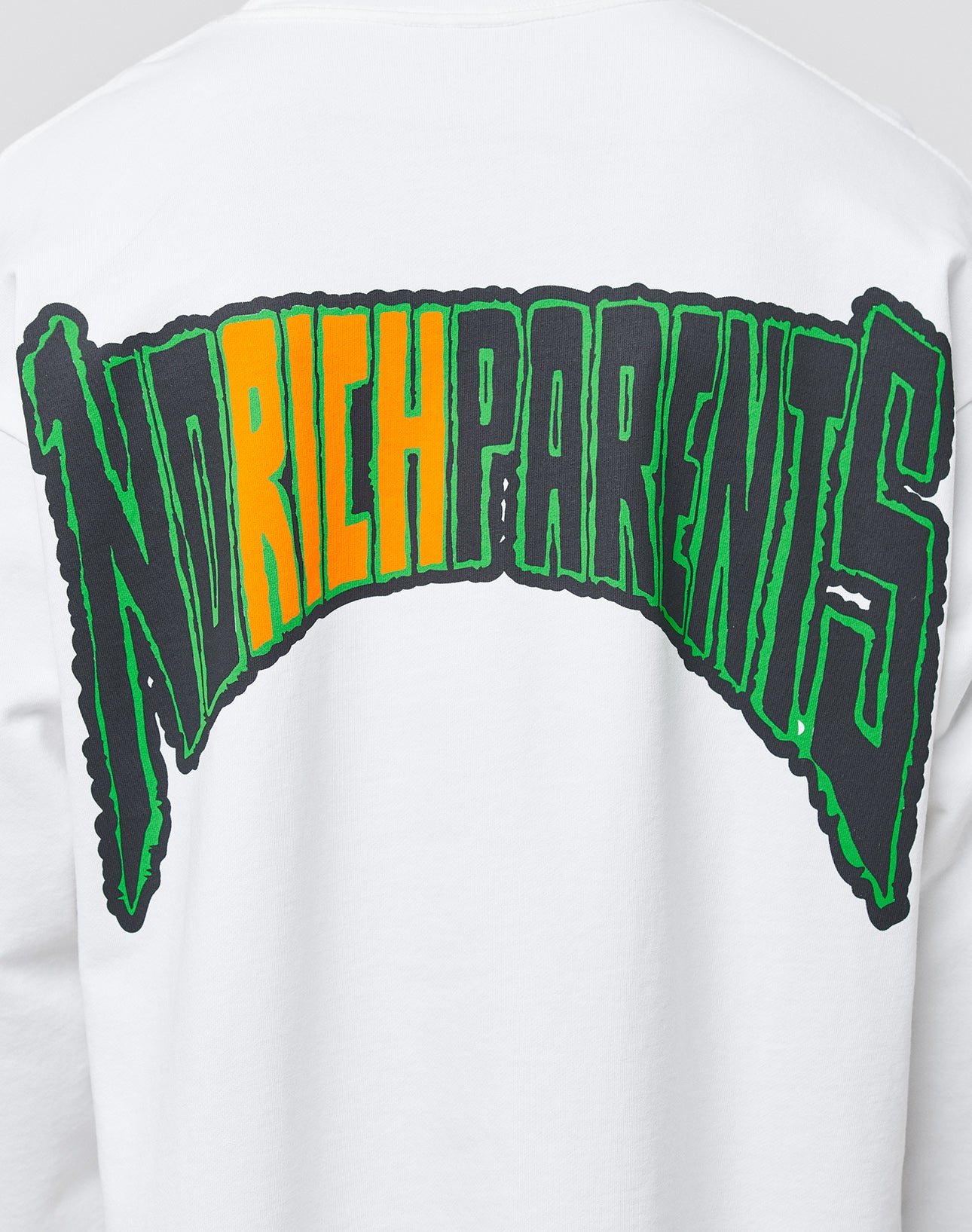 The No Rich Parents Longsleeve by LIVE FAST DIE YOUNG is a white, 100% cotton shirt with bold green and yellow graffiti text reading NO RICH PARENTS on the back. Features jagged black outlines and a Regular Fit for everyday comfort.
