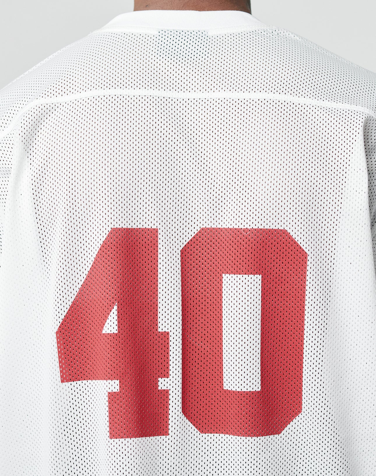 The LIVE FAST DIE YOUNG LFDY Mesh Jersey features a classic V-Ausschnitt, 100% polyester construction, white mesh design, and bold red number 40 on the back.