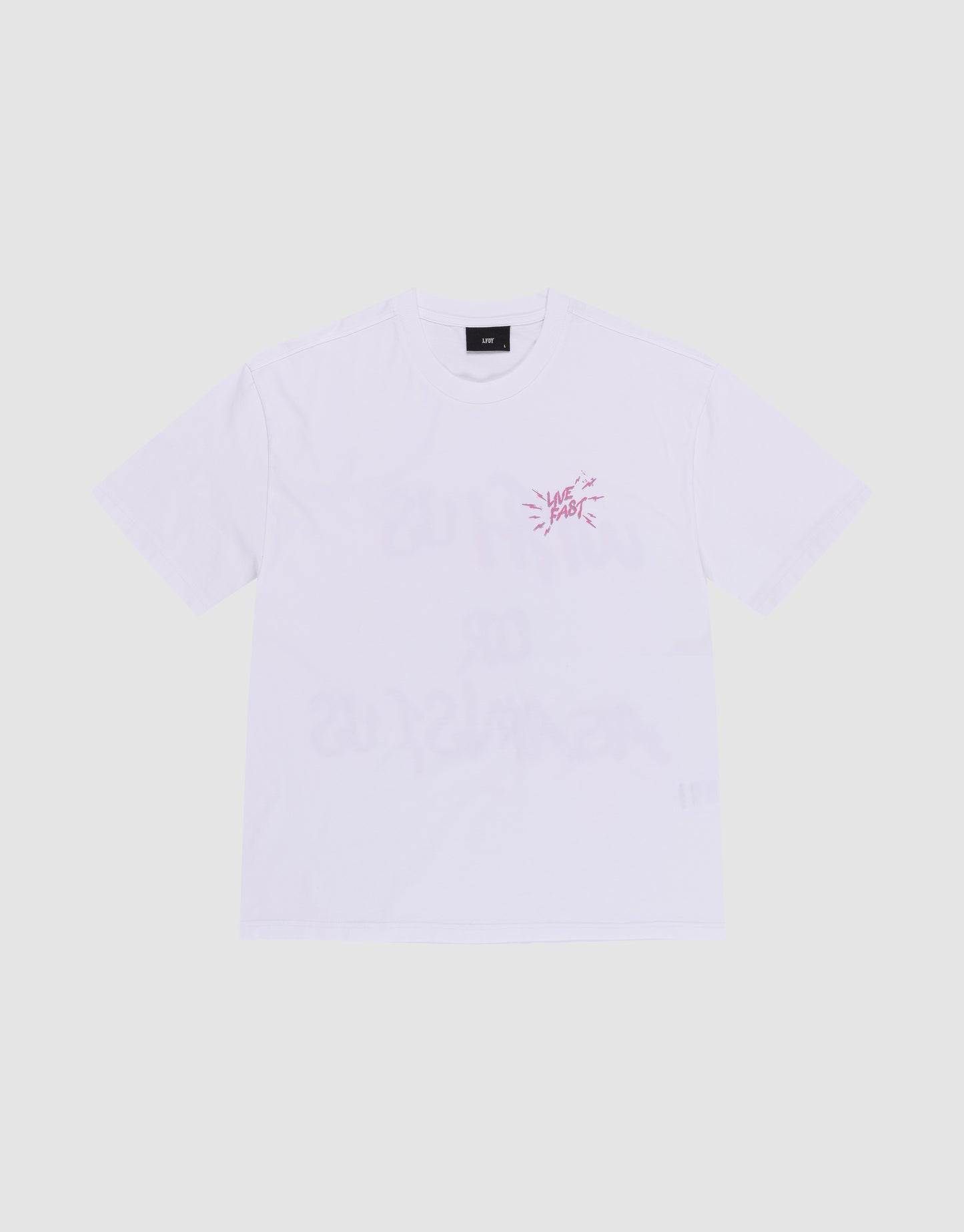 The LFDY Against Us Tee by LIVE FAST DIE YOUNG is a plain white, 100% Baumwolle short-sleeve shirt with a small pink front print and text on the left chest, shown laid flat on a light grey background.