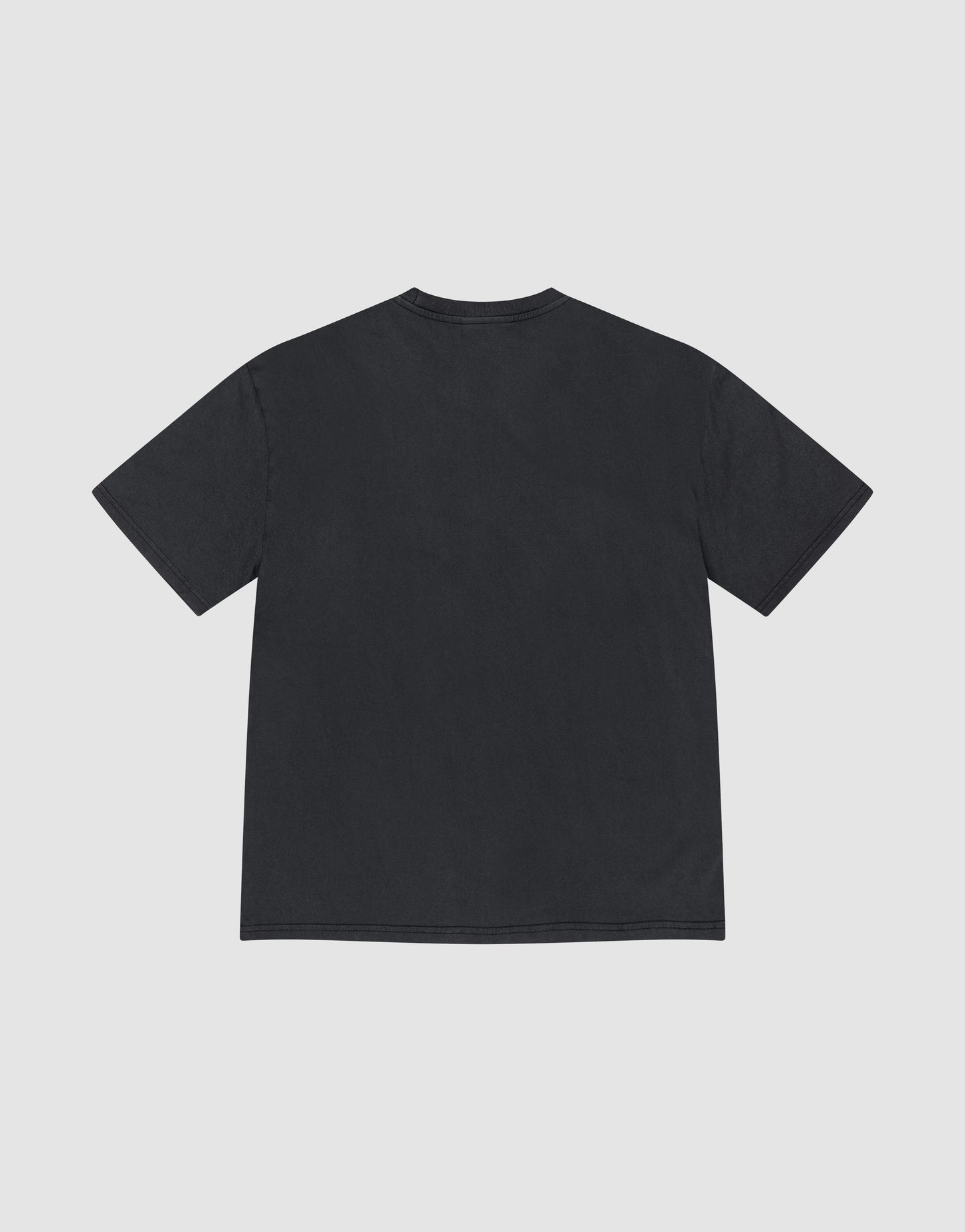 The LFDY Fire Chest Tee by LIVE FAST DIE YOUNG, a plain black short-sleeve t-shirt made from 100% Baumwolle, is shown from the back on a light gray background with no visible designs or logos.