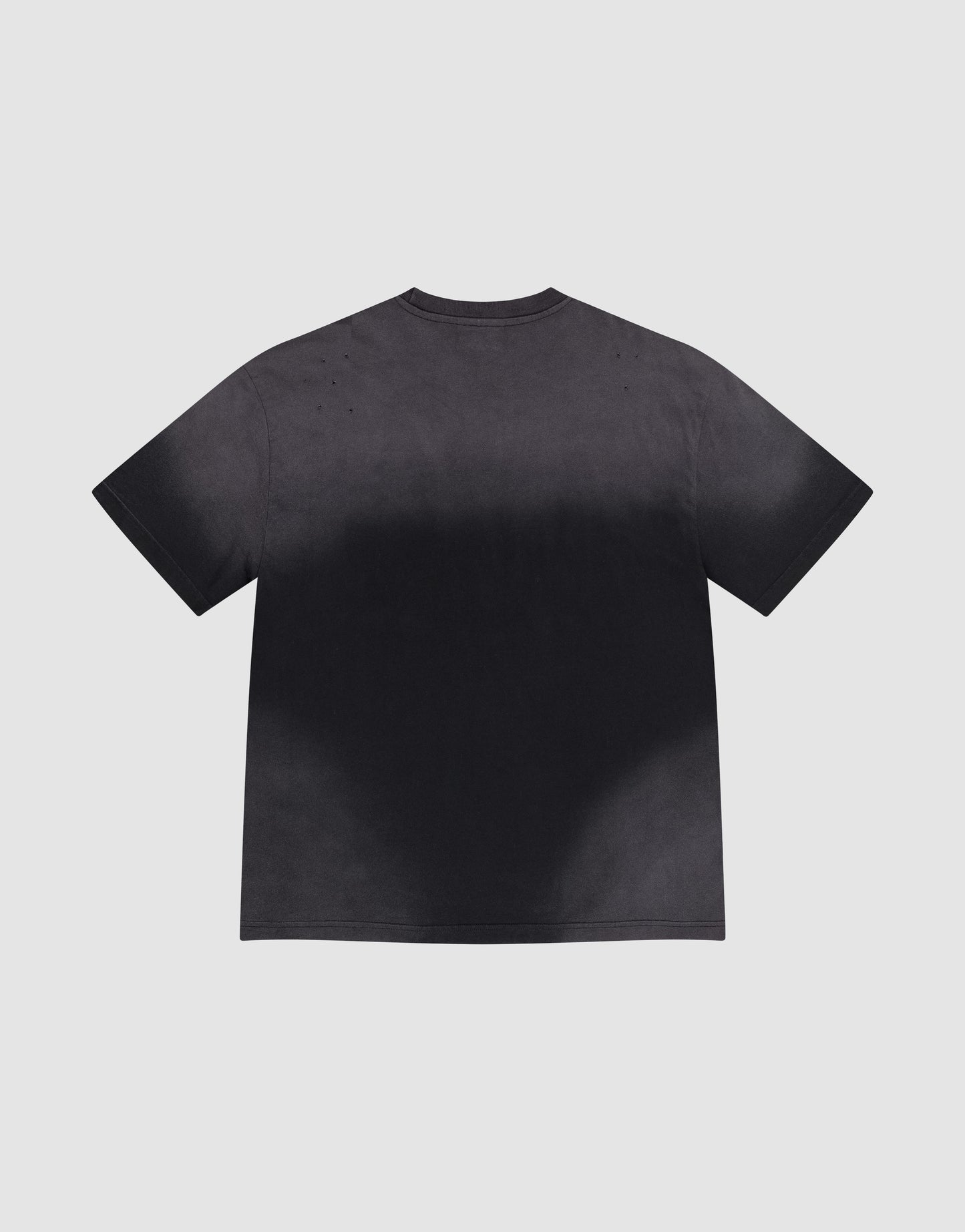 The LFDY Emblem Patch Tee by LIVE FAST DIE YOUNG is an oversized, short-sleeve crew neck made from 100% Baumwolle, featuring a black and dark gray gradient and shown flat with the back side up on a light gray background.