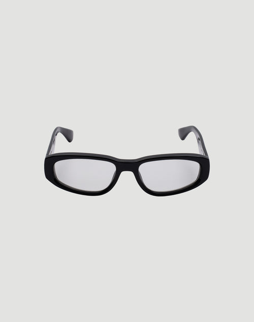 Front view of LIVE FAST DIE YOUNG LFDY x Chimi Shades 09, black rectangular frame with clear photochromic lenses offering UV protection, displayed on a plain light gray background.