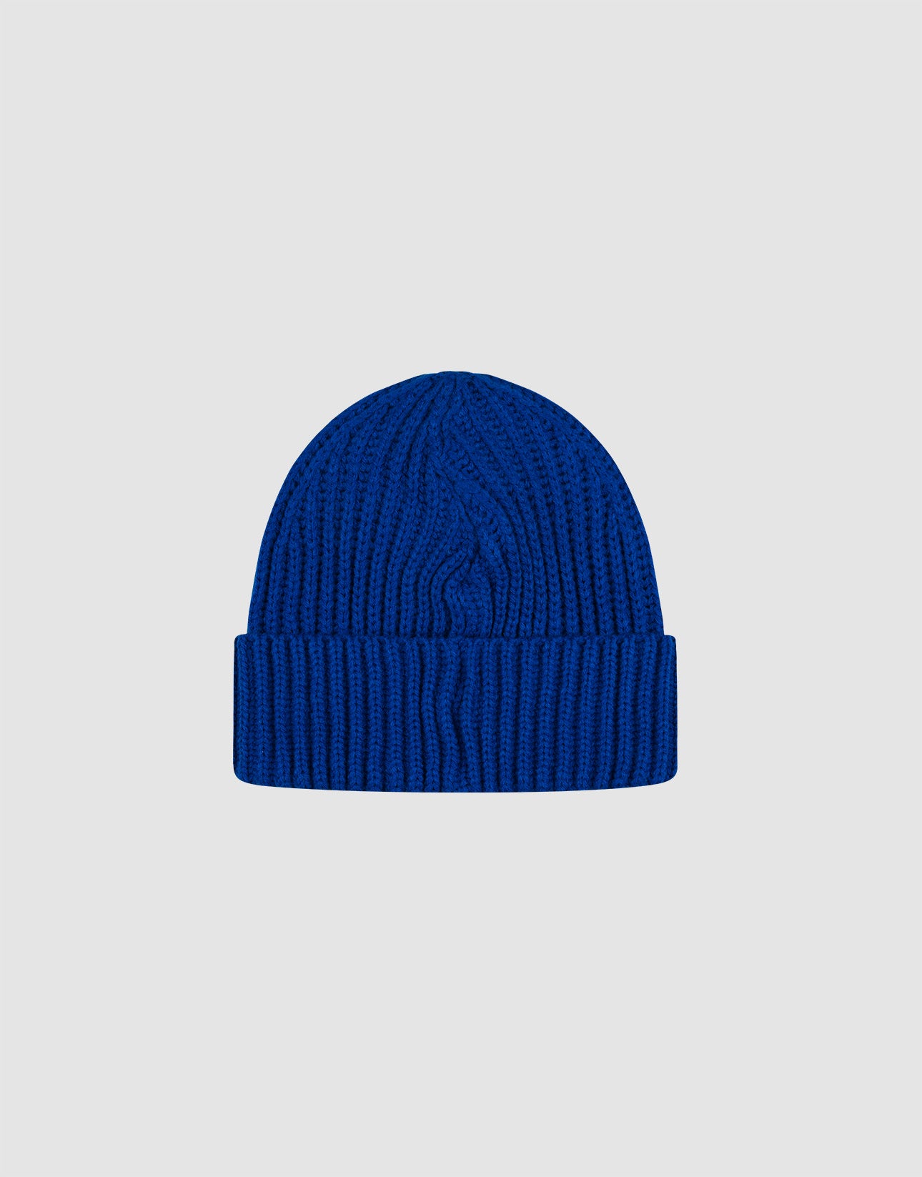 A royal blue LIVE FAST DIE YOUNG Rib Knit Beanie in soft polyacryl with a folded brim, shown against a plain light gray background. One size for everyday comfort and style.