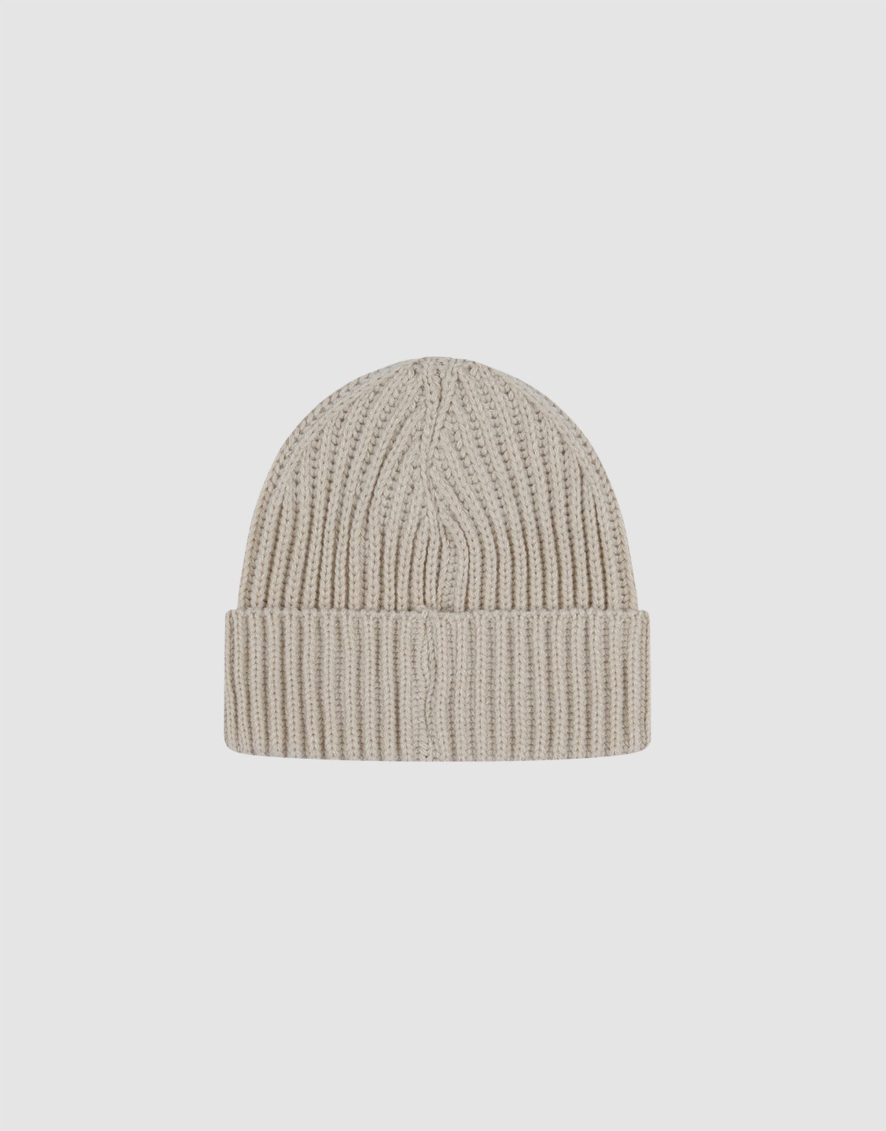 The LIVE FAST DIE YOUNG Rib Knit Beanie in beige, crafted from soft polyacryl with a ribbed texture and folded cuff, is shown against a plain white background.