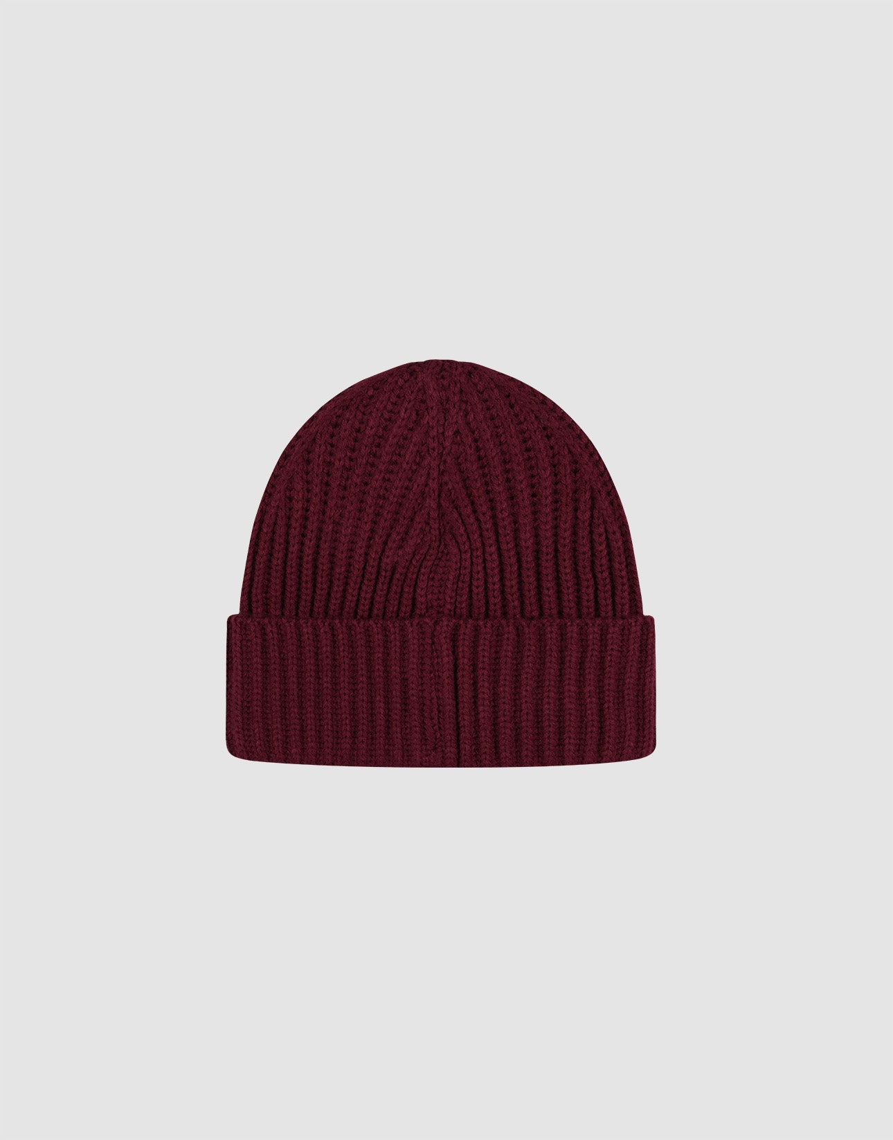 The LIVE FAST DIE YOUNG Rib Knit Beanie in maroon, One Size, features a folded brim and subtle flag-label, crafted from soft polyamid ribbed knit, shown on a plain light grey background.