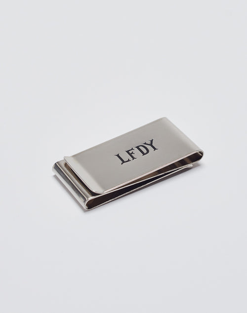 The Basic Money Clip by LIVE FAST DIE YOUNG, made of stainless steel (Edelstahl) with a LFDY engraved logo, Modellnummer LF2305-13597, is displayed on a plain white background.