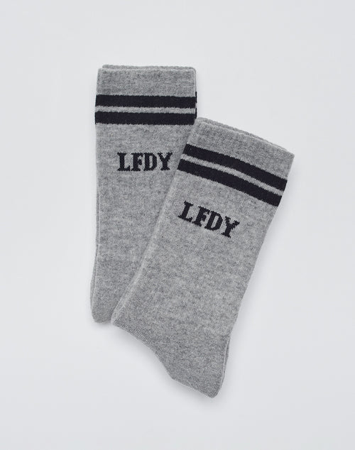 A 2-pack of gray Basic Socks by LIVE FAST DIE YOUNG, featuring black stripes near the top and LFDY lettering. Displayed on a white background. Easy-care and comfortable for everyday wear.