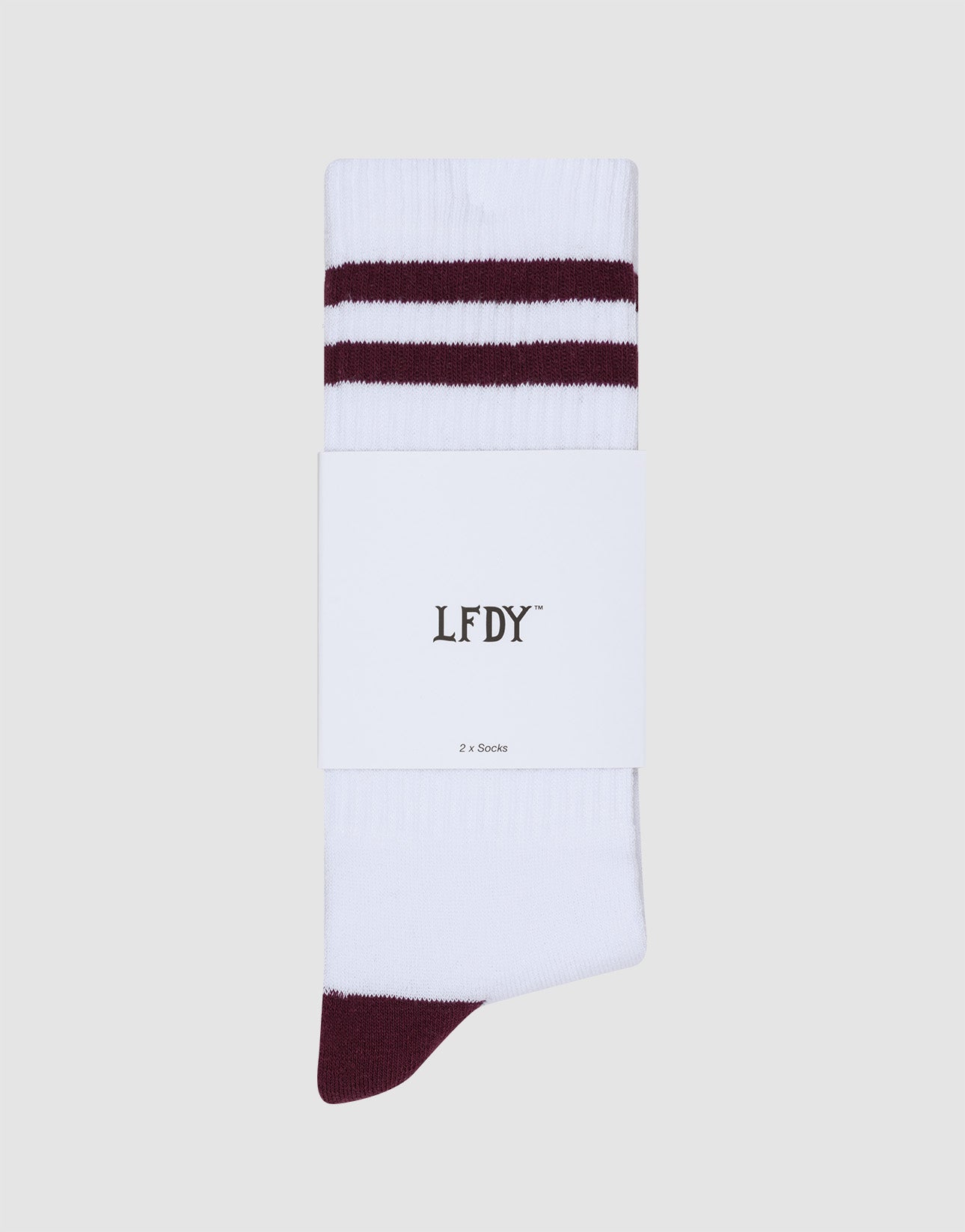 LIVE FAST DIE YOUNG 2 Tone Socks (2 Pack): white socks with two maroon stripes near the top and a maroon toe, made from an easy-care cotton-polyamide blend. Comes with a white label reading "LFDY" and "2x Socks.
