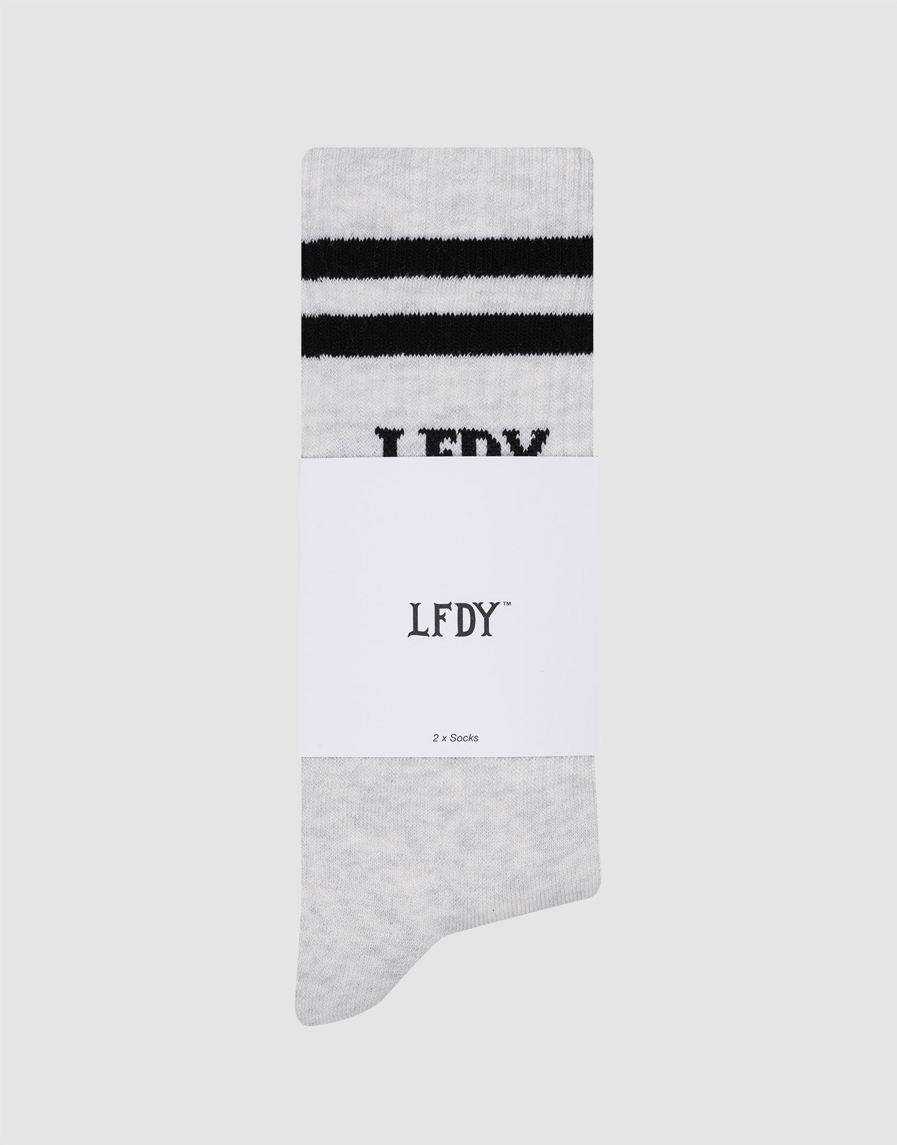 A single light gray LIVE FAST DIE YOUNG Basic Sock (One Size) with two black stripes, partial LFDY text, and a white label reading “LFDY” and “2 P. Socken”, shown on a plain gray background—pflegeleicht waschen.