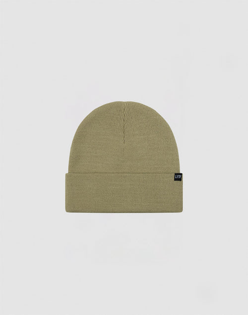 The LIVE FAST DIE YOUNG Basic Beanie is a khaki green Polyacryl knit hat in One Size with a folded brim and small black rectangular tag (LF2411-16606) on the left side, shown against a light grey background.