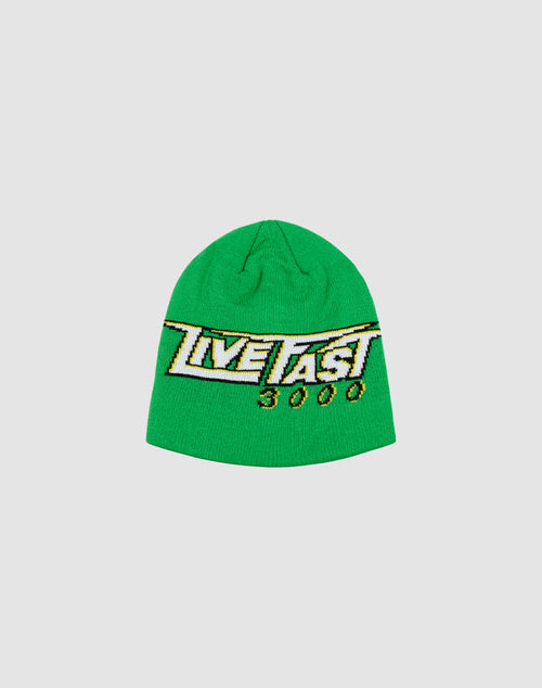 The Live Fast 3000 Beanie by LIVE FAST DIE YOUNG is a bright green polyacryl knit with a bold yellow, black, and white “LIVE FAST 3000” graphic on the front. Shown on a light gray background. One size fits all.