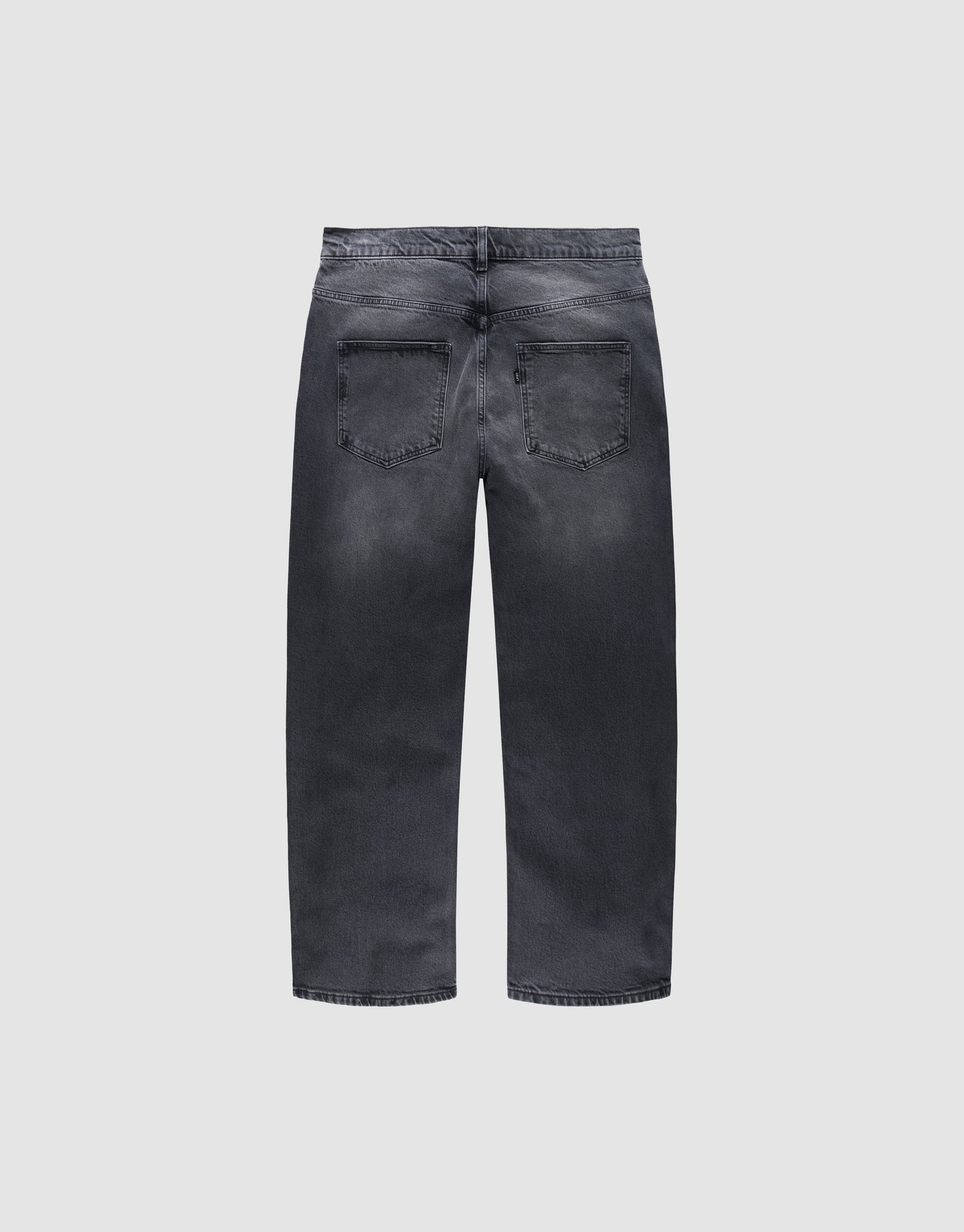 The LFDY Tire Tracks Denim by LIVE FAST DIE YOUNG is a pair of faded black, 100% Baumwolle jeans with a baggy, gerades Bein cut and two back pockets, shown from the back on a plain white background.