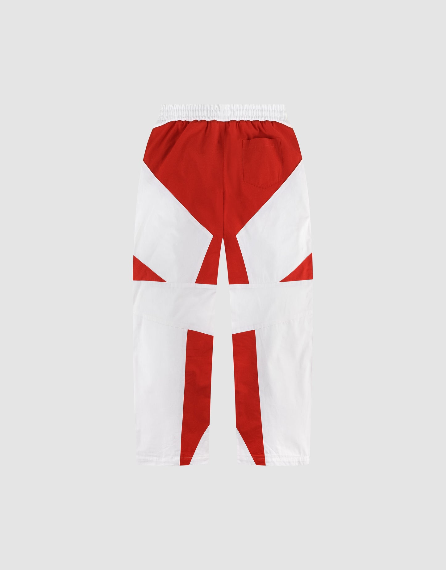 The LFDY Cross Pants by LIVE FAST DIE YOUNG feature bold red and white geometric blocks, an elastic waistband, and wide legs for a relaxed oversize fit. Made from cotton for comfort.