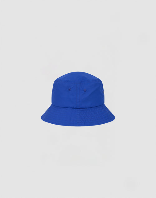 The LIVE FAST DIE YOUNG Nylon Bucket Hat features a wide brim and visible stitching in plain blue, shown against a light gray background.
