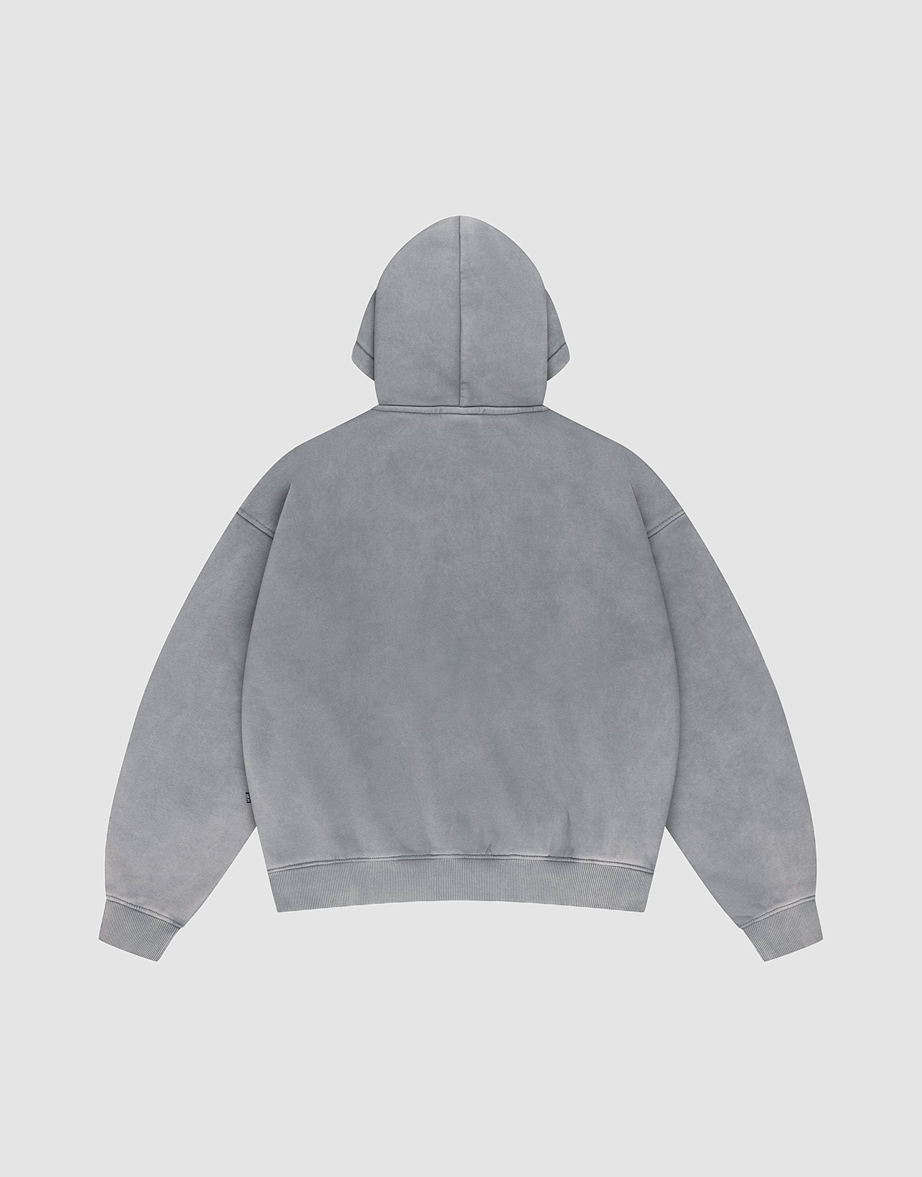 The LIVE FAST DIE YOUNG Basic +49 Hooded is a plain, oversized gray hoodie shown from the back with a large hood, dropped shoulders, and ribbed cuffs and hem, set against a neutral background and featuring no visible logos or designs.
