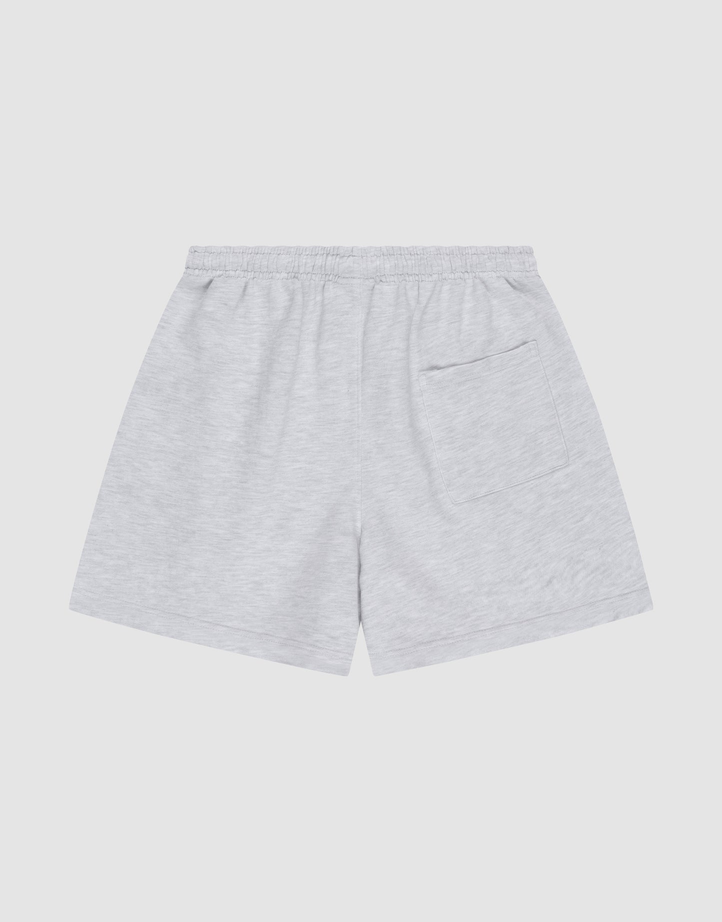 The Basic Sweat Shorts by LIVE FAST DIE YOUNG feature a light gray hue, logo print, oversized fit, elastic waistband, and a single patch pocket on the back right side, shown on a plain white background.