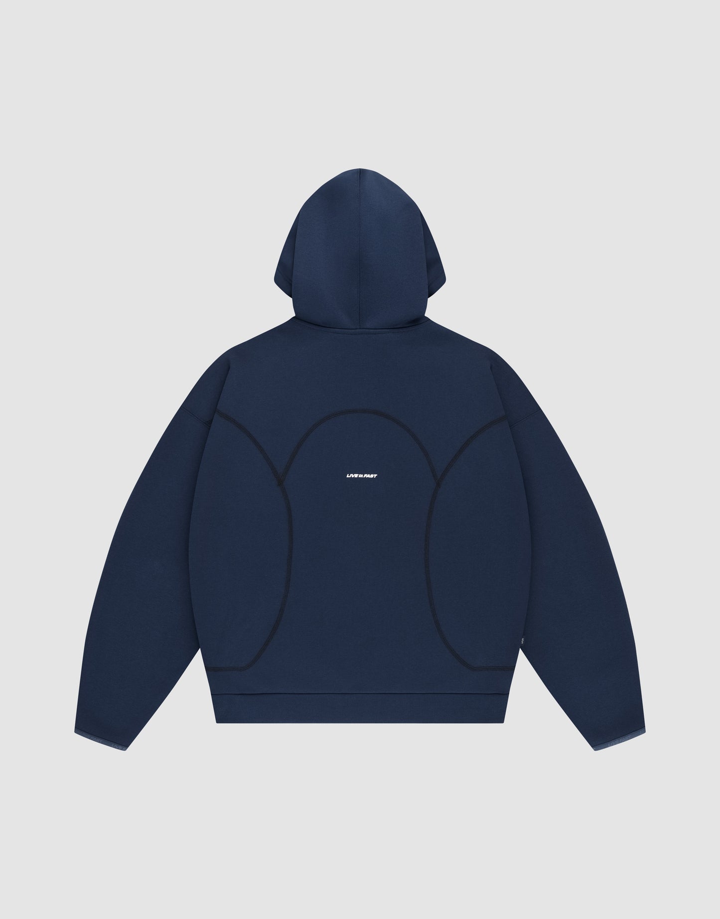 A navy blue oversized LFDY Active Fleece Hooded Zip by LIVE FAST DIE YOUNG is shown flat with the hood up, featuring black curved seam details and small white logo print centered on the back.