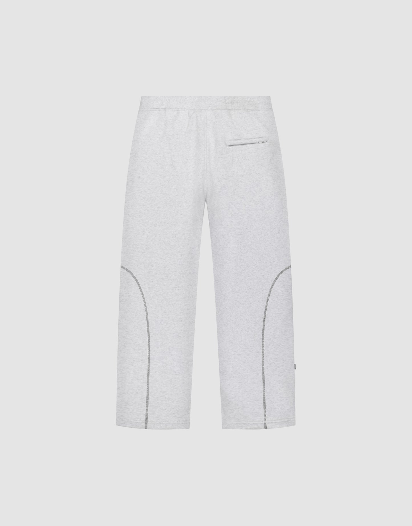 The LFDY Active Fleece Jogger by LIVE FAST DIE YOUNG features a wide fit, elastic waistband, zippered back pocket, curved lower leg seams, and a subtle logo print, shown against a plain white background.