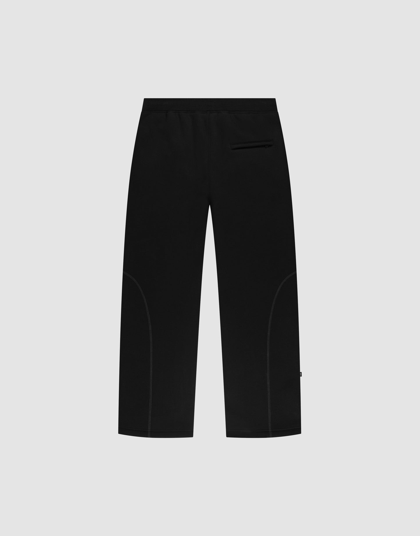 The LFDY Active Fleece Jogger by LIVE FAST DIE YOUNG features a black wide fit, straight legs, elastic waistband, right-side back pocket, and subtle seam detailing, shown against a light gray background.