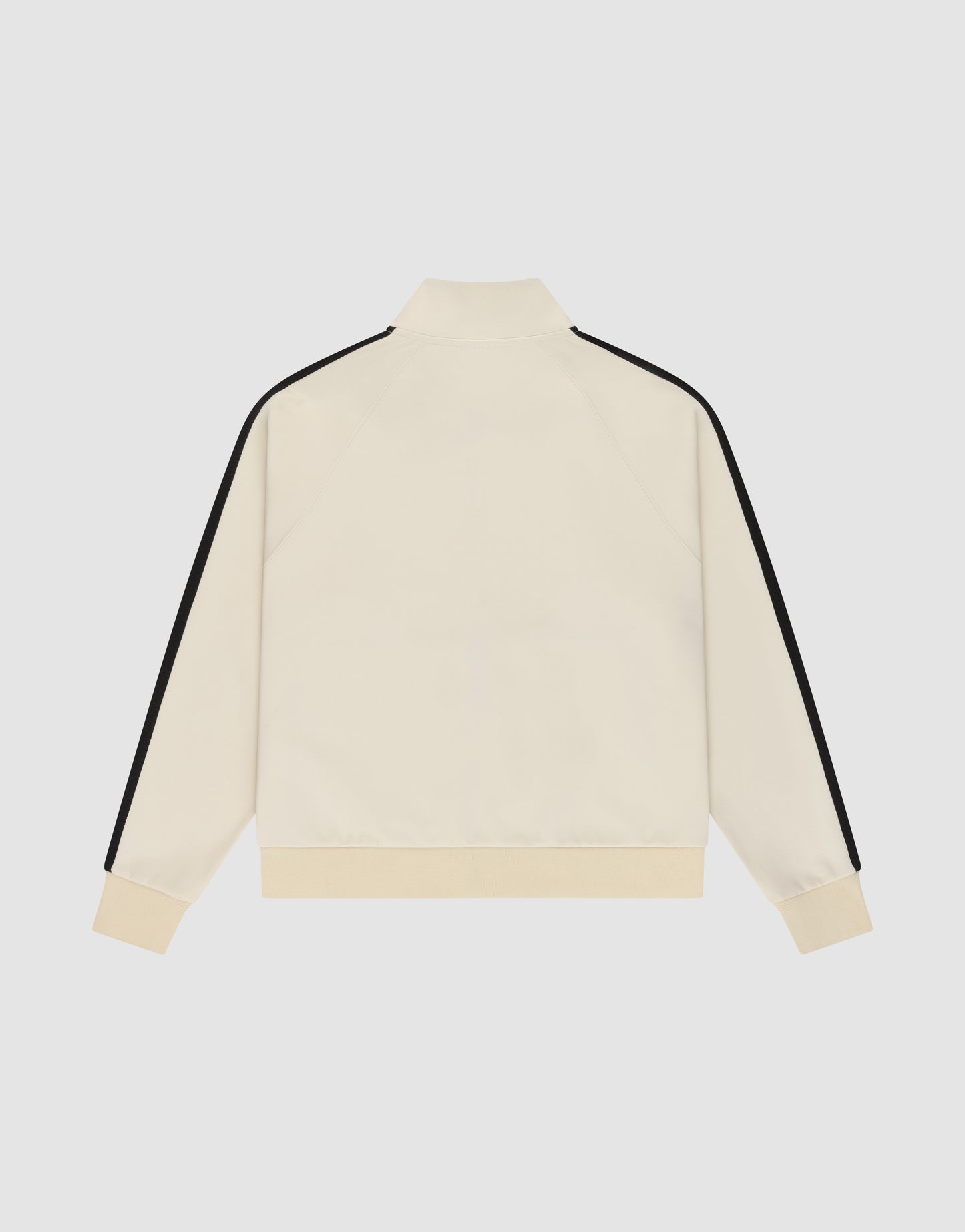 The LFDY Striped Track Jacket by LIVE FAST DIE YOUNG is cream-colored with black stripes along the raglan sleeves, a zipper closure, and ribbed cuffs and hem. Shown from the back against a plain light gray background.