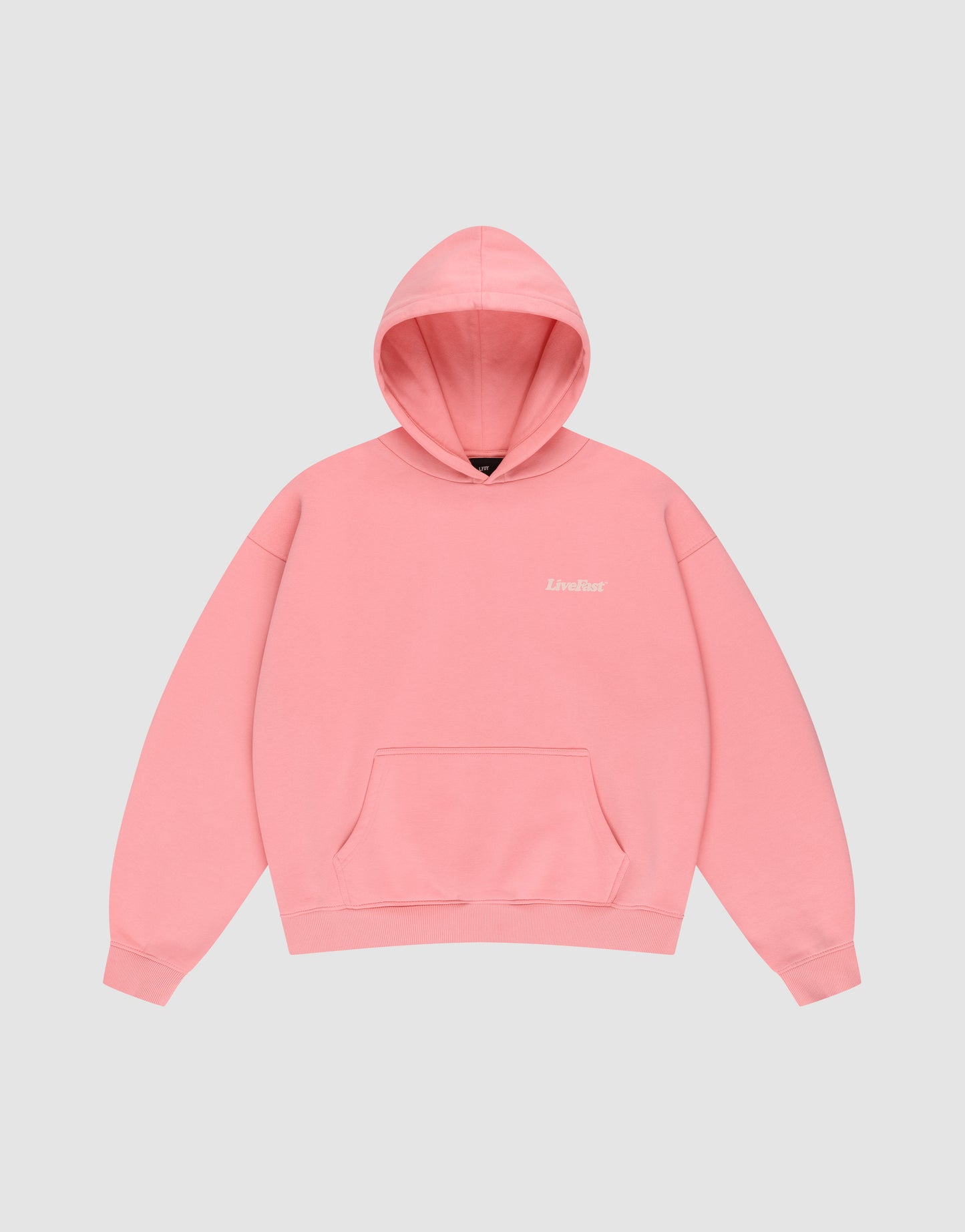 The Basic 360 Hooded by LIVE FAST DIE YOUNG is an oversized plain pink hoodie with a front pocket, topstitching, and small white "LIVELIFE" text on the left chest, shown on a light gray background.