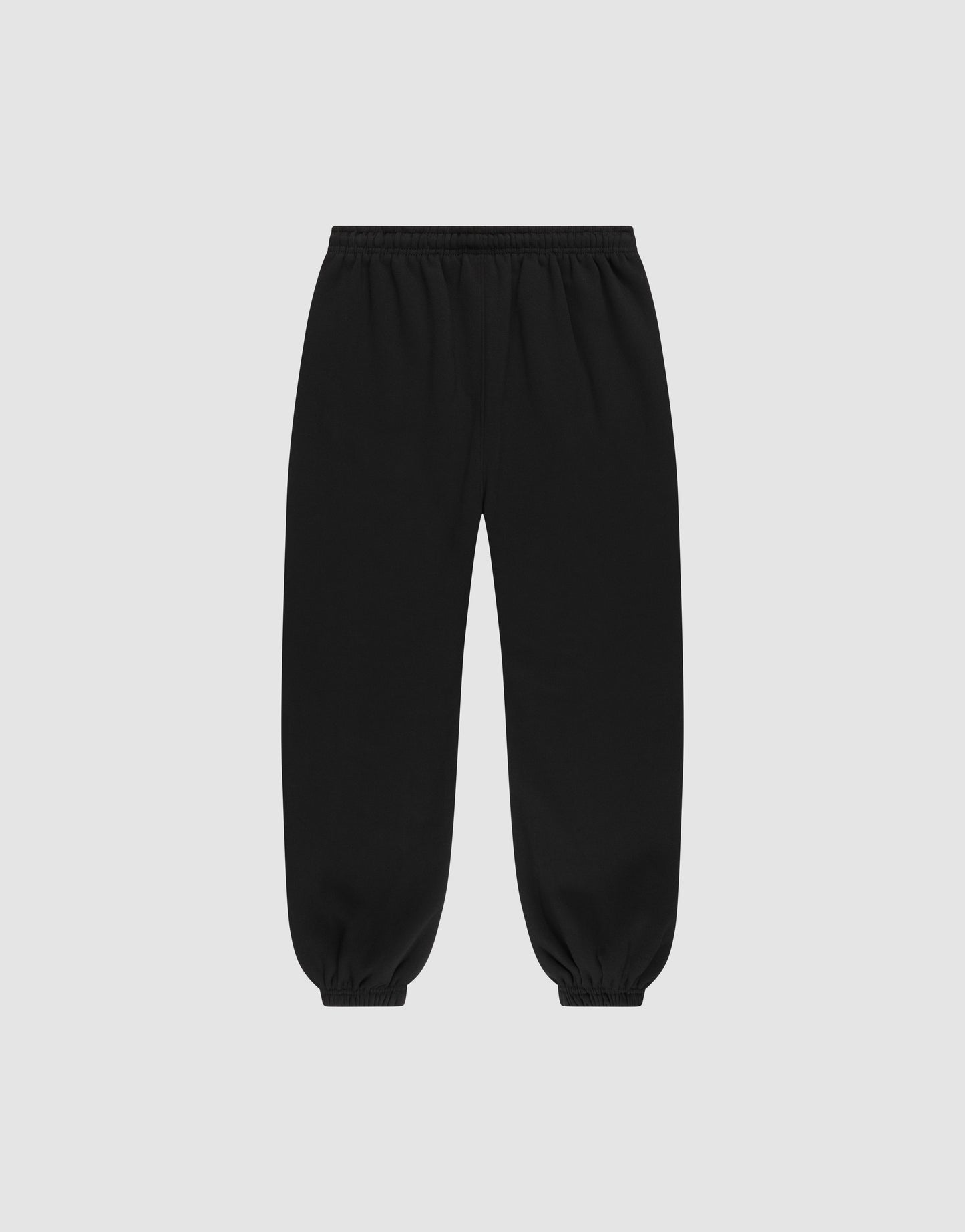 The LIVE FAST DIE YOUNG Basic Loose Jogger in black features a relaxed fit, Elastik-Bund waistband, and elastic ankle cuffs, shown laid flat on a light gray background.