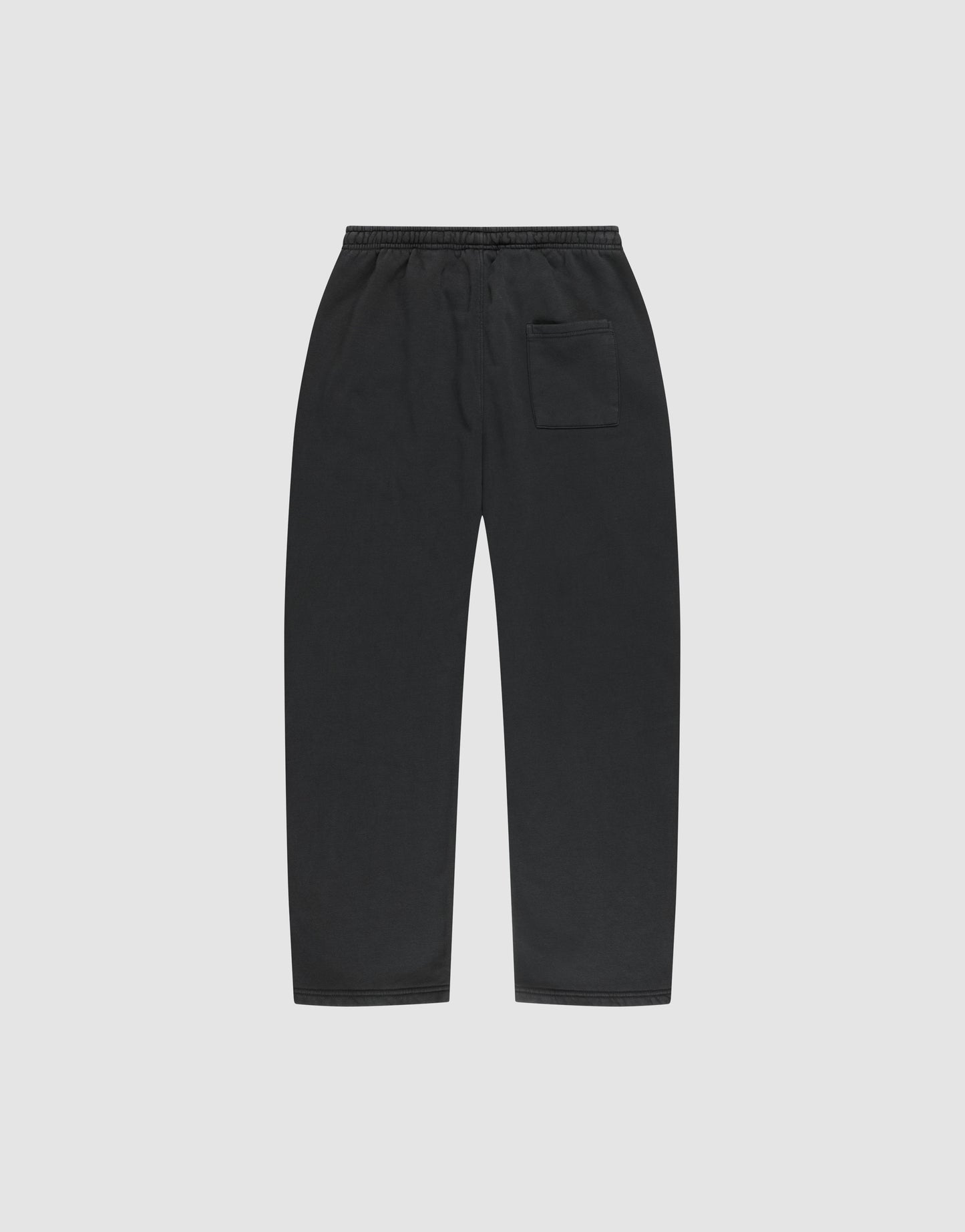 The LIVE FAST DIE YOUNG Basic Wide Jogger features a black wide fit, straight-leg design with an elastic waistband and a single patch pocket on the right, shown flat on a plain light gray background.