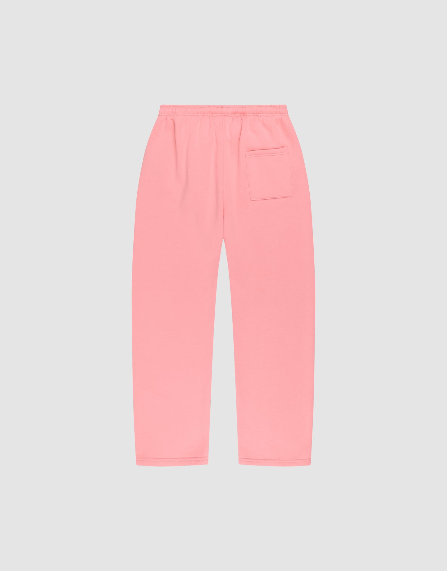 The LIVE FAST DIE YOUNG Basic Wide Jogger in light pink features an oversized fit, elastic waistband, and a right-side patch pocket, shown laid flat on a plain light gray background.