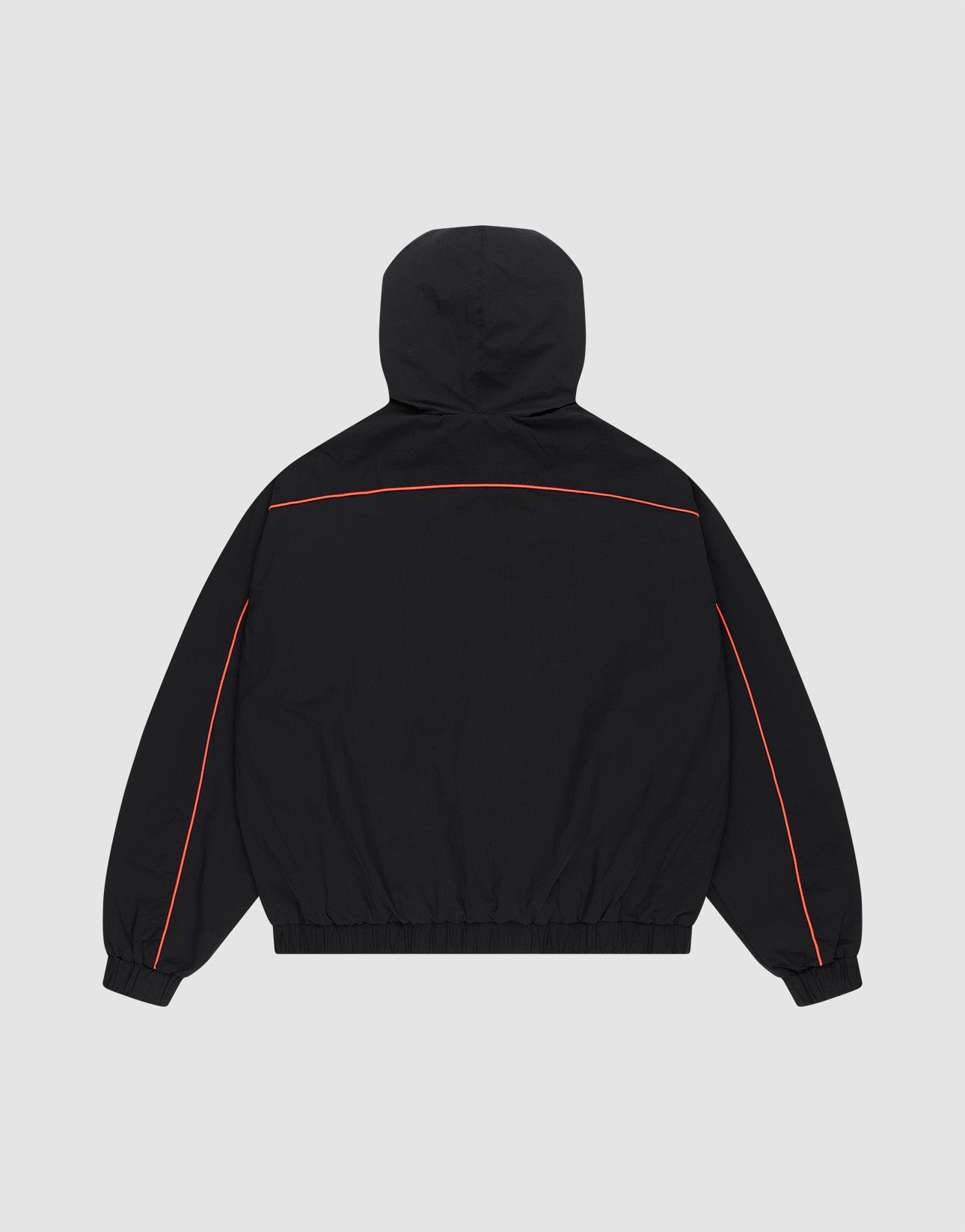 The LIVE FAST DIE YOUNG Live Fast Trackjacket in black Regular Fit is shown from the back with red piping on the sleeves and upper back, elastic cuffs and waistband, and zippered side pockets, against a plain light gray background.