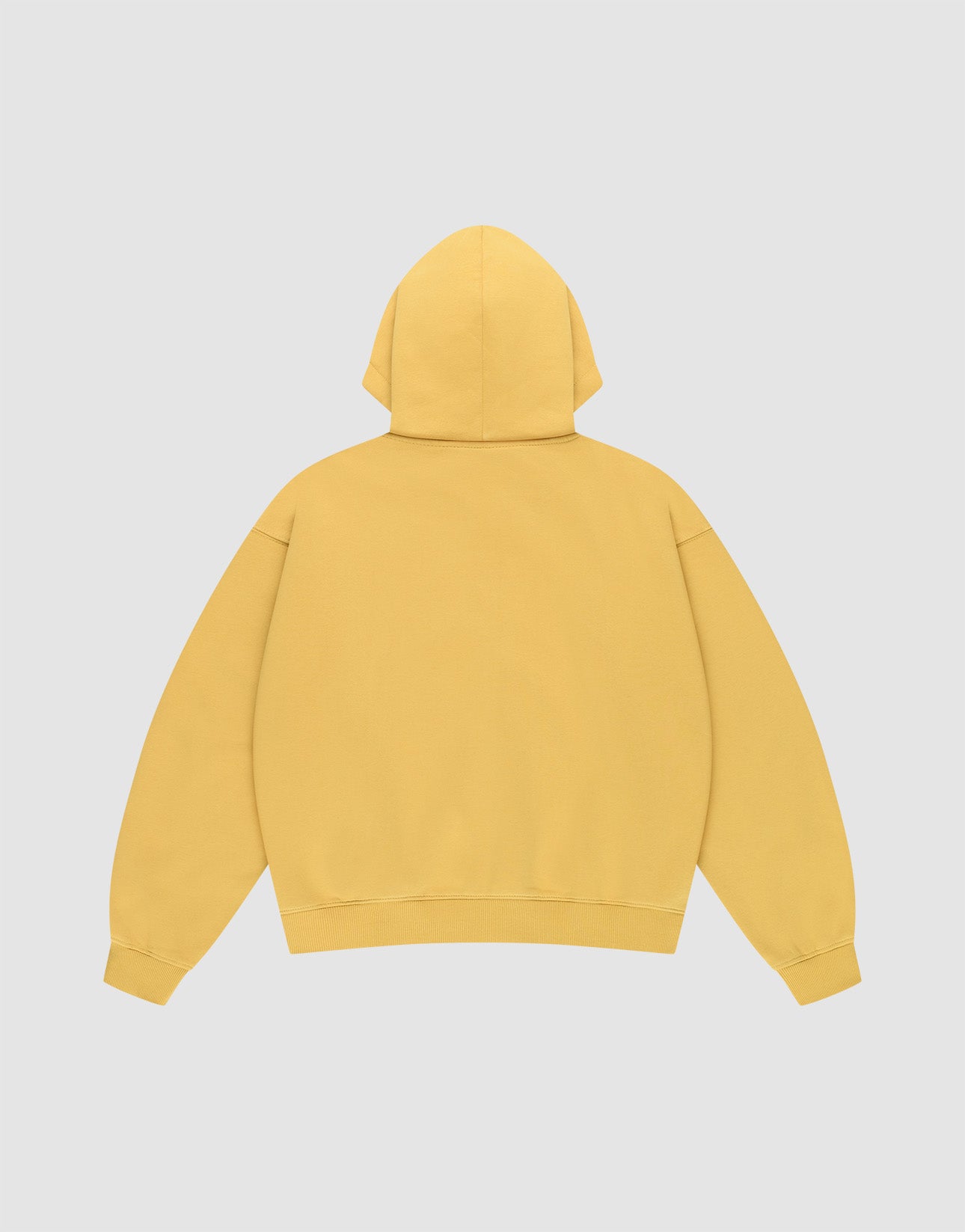 The LIVE FAST DIE YOUNG Live Fast Sweatsuit Jacket, a plain yellow oversized hoodie, is laid flat with the back facing up against a light gray background.