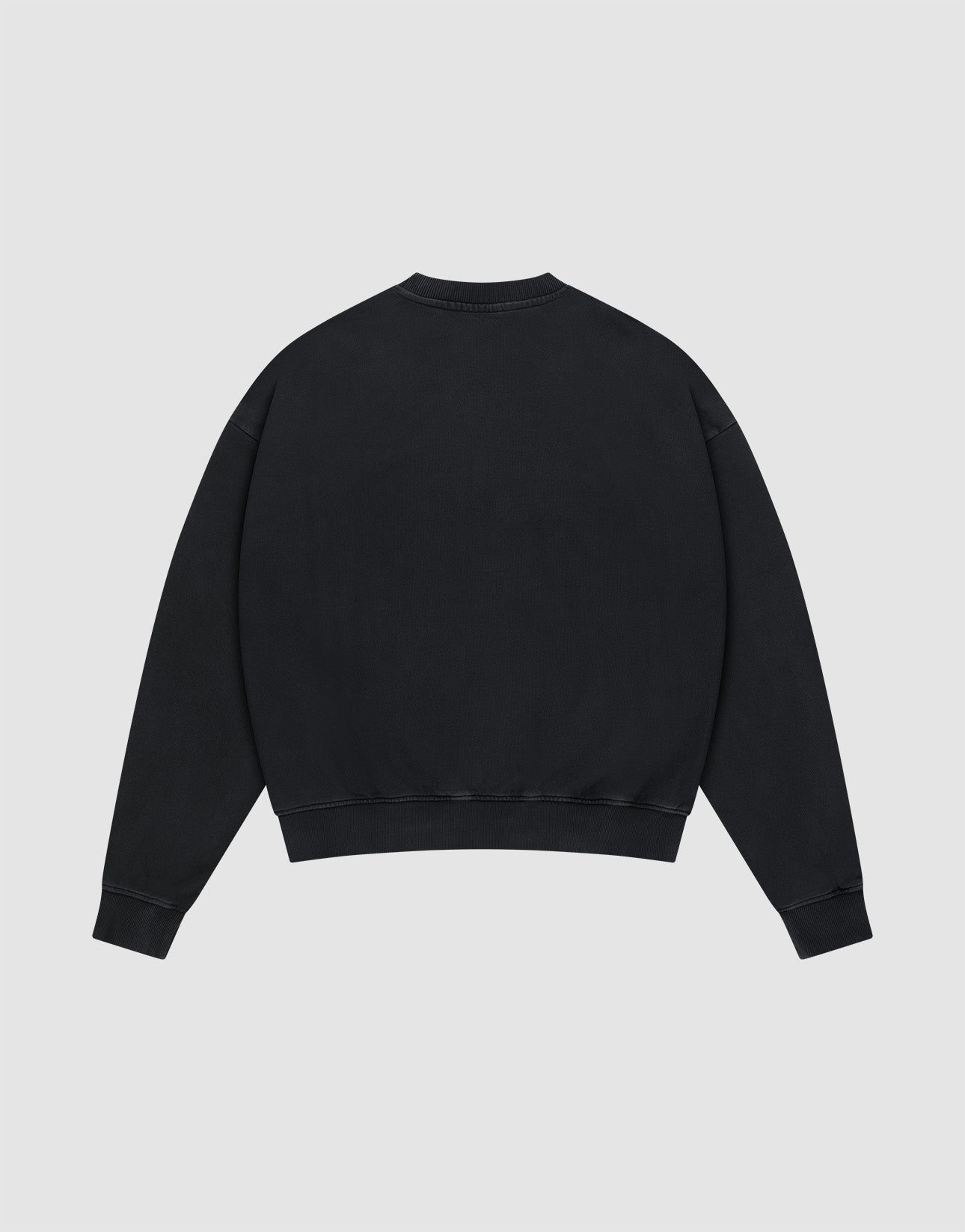 The LFDY Hardwear Sweater by LIVE FAST DIE YOUNG, a plain black oversized crewneck, is displayed from the back, laid flat on a light grey background.
