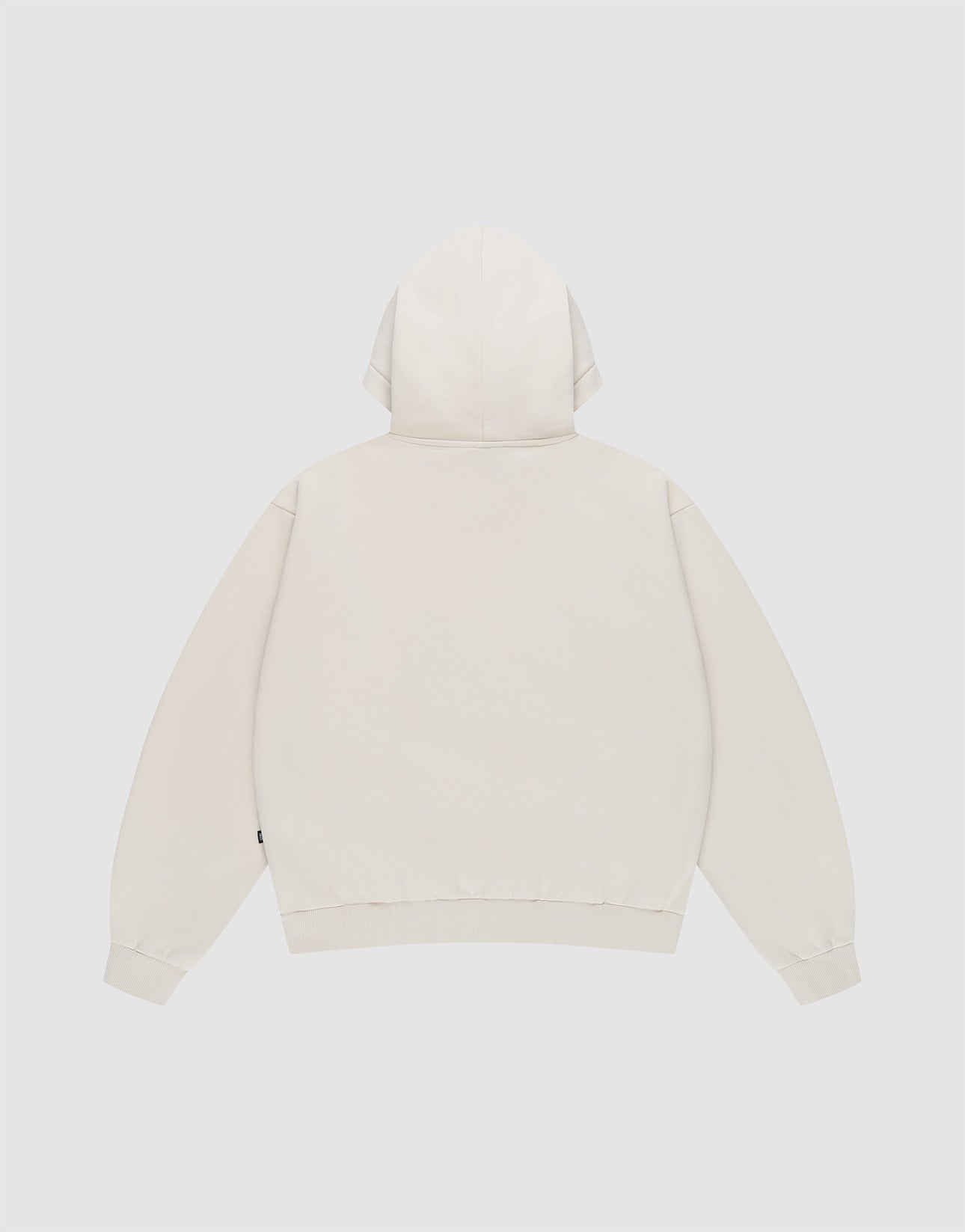 The LIVE FAST DIE YOUNG Basic Blank Hooded is an oversized, light beige hoodie made from soft Baumwolle, shown from the back on a white background with long sleeves, ribbed cuffs and waistband, and no visible logos or designs.