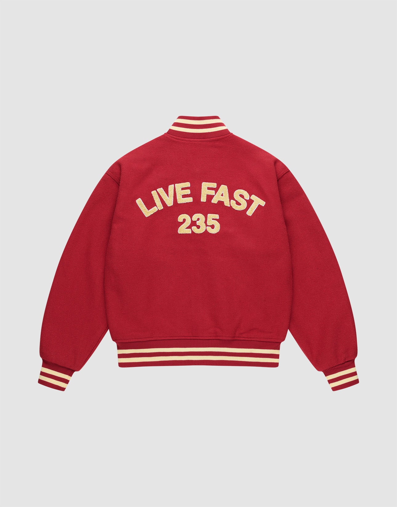The OC College Jacket by LFDY is a red regular-fit style with cream stripes on the collar, cuffs, and hem. Bold cream "LIVE FAST 235" lettering stands out as a Rücken-Stick on the back for added flair.