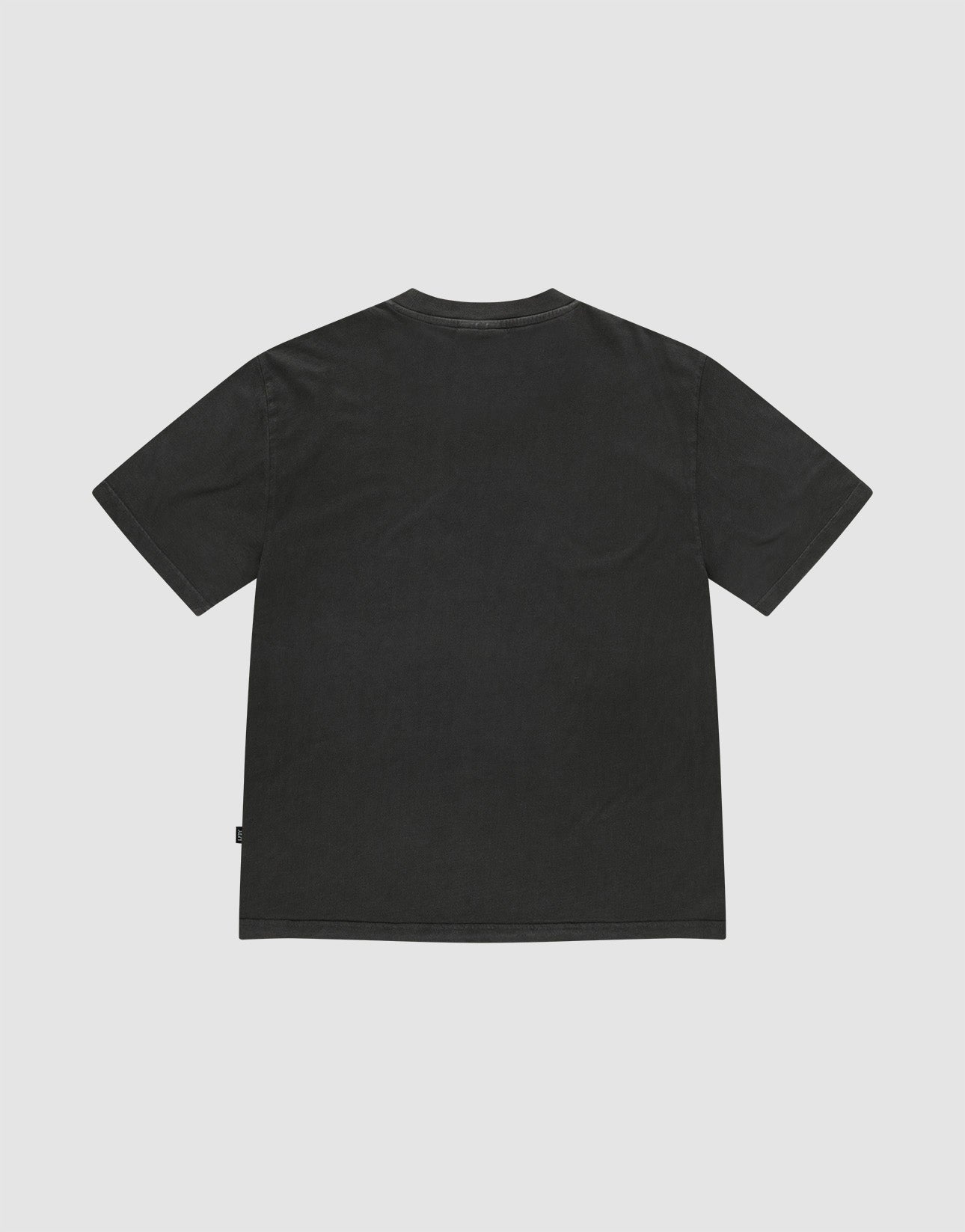 Back view of the Live Fast LF Tee by LIVE FAST DIE YOUNG, a plain black oversize fit short-sleeve t-shirt with a crew neck, made from 100% Baumwolle, shown flat on a light gray background with no visible designs or logos.