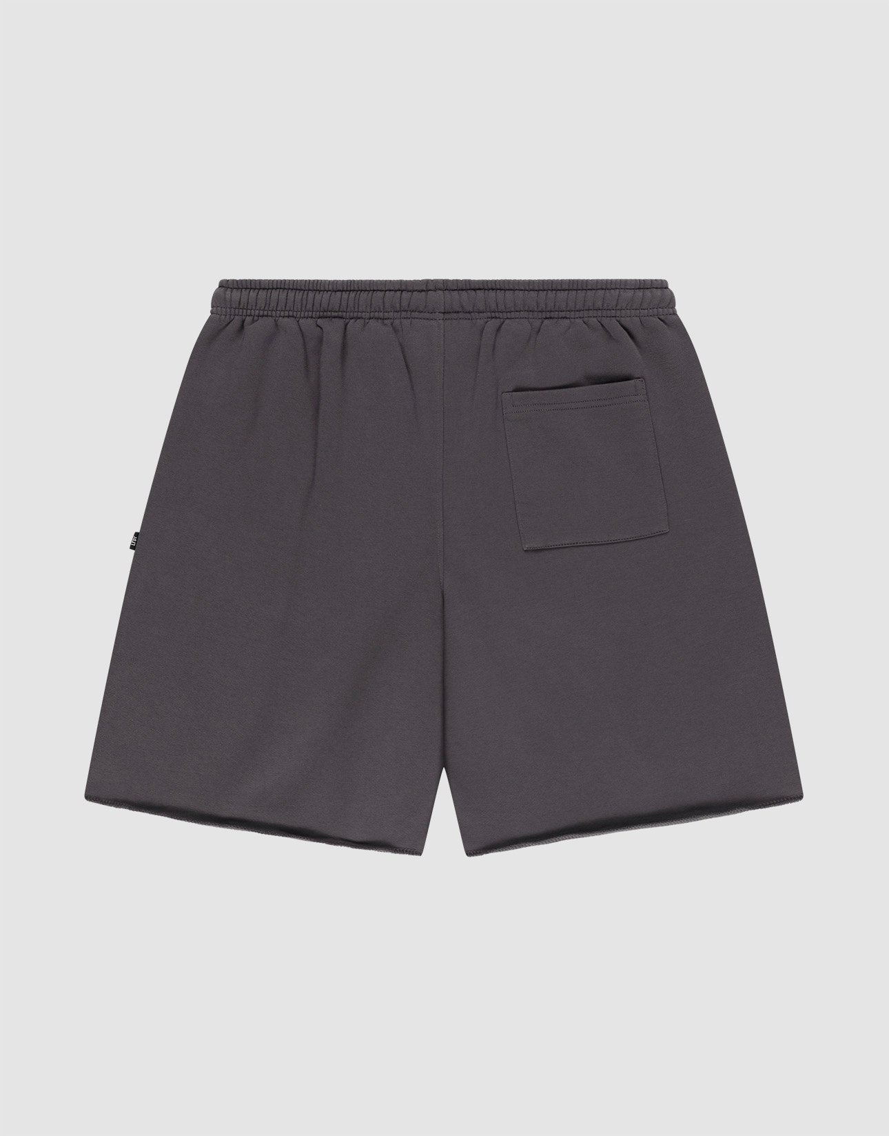The Live Fast LF Shorts by LIVE FAST DIE YOUNG are dark gray, wide-fit athletic shorts with an elastic waistband, side pockets, and a single back pocket. Their minimalist design offers comfort and style on a plain white background.