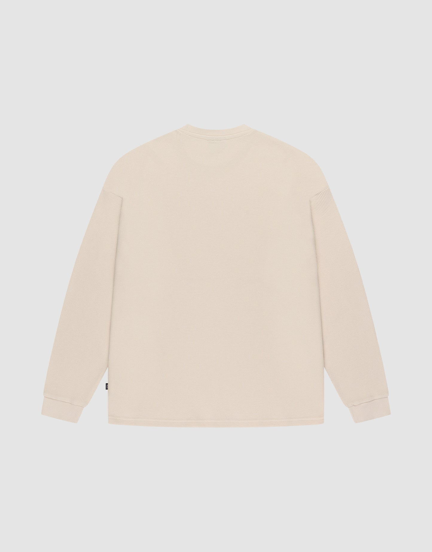 The Blank Waffle Longsleeve by LIVE FAST DIE YOUNG is shown flat on a white background, back view. Made from 100% Baumwolle with an oversize fit and subtle Ripp-Bündchen at the cuffs—no patterns, logos, or graphics.