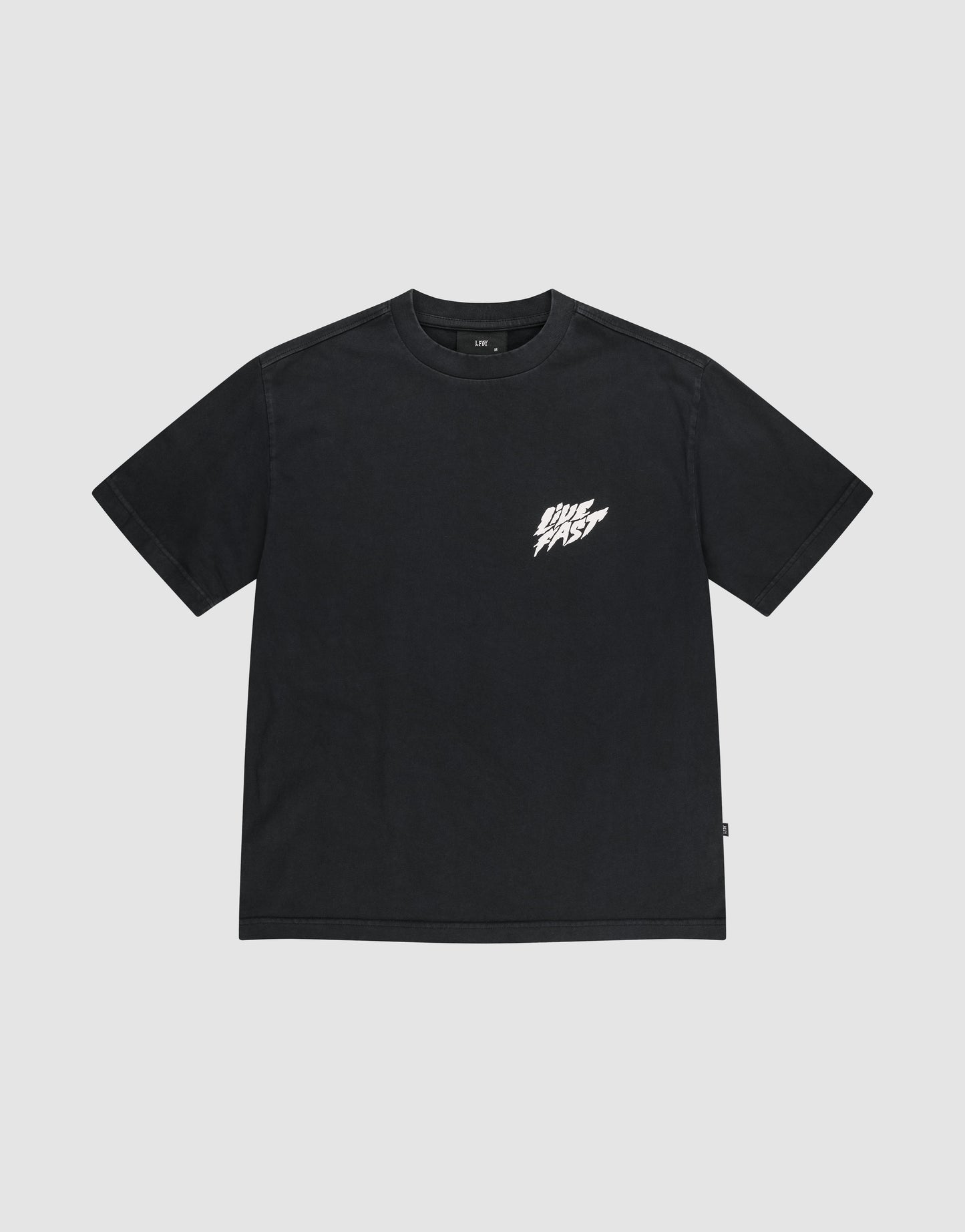 The LFDY Logo Tee by LIVE FAST DIE YOUNG is a black oversized short-sleeve t-shirt with a small white "DIVE FAST" graphic on the left chest, shown on a light gray background. Made from 100% Baumwolle for comfort and quality.