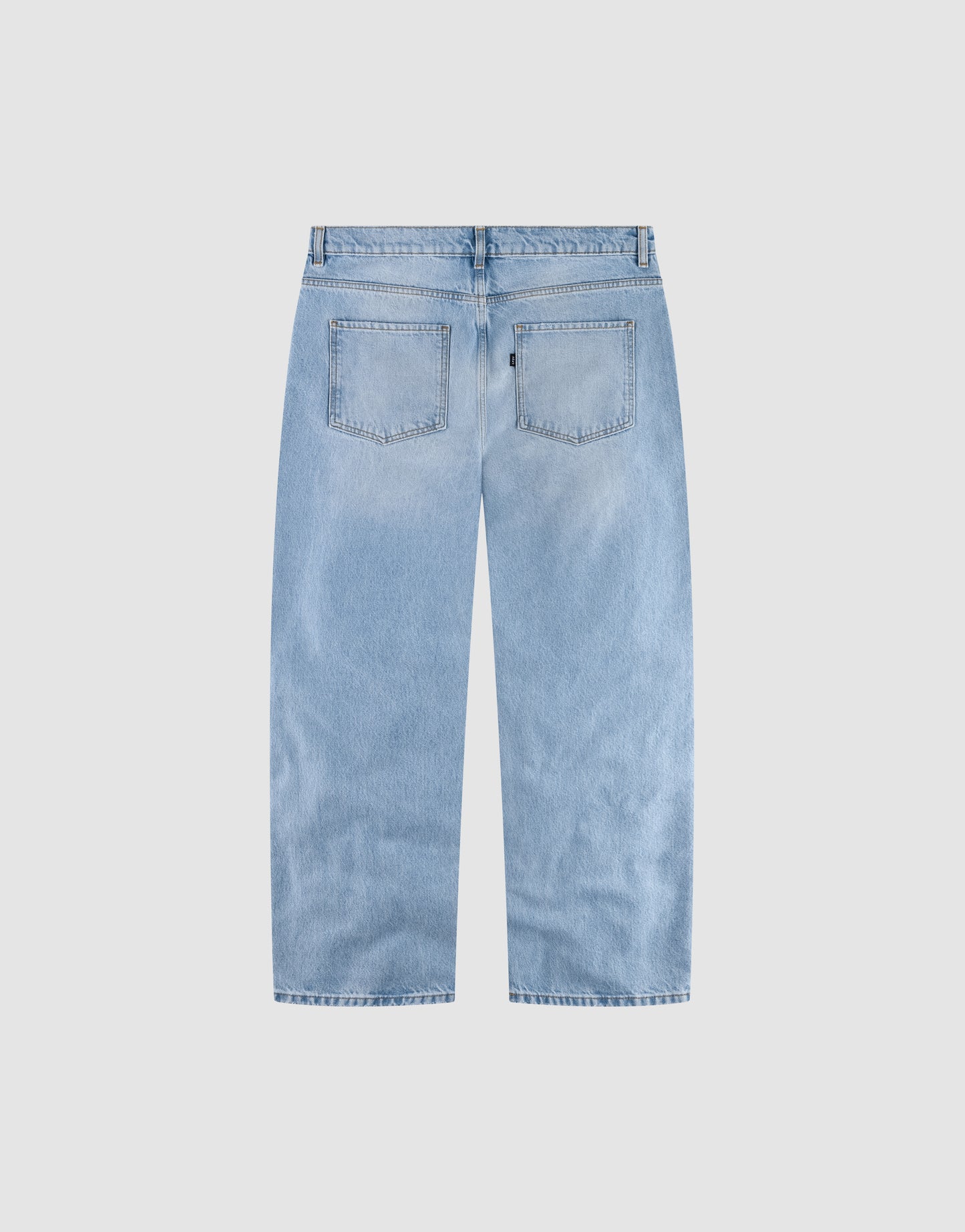 The LFDY Distressed Baggy Denim jeans by LIVE FAST DIE YOUNG are light blue, baggy fit, straight-leg style with two large back pockets, belt loops, and a simple waistband. Made from 100% Baumwolle, shown flat on a white background.