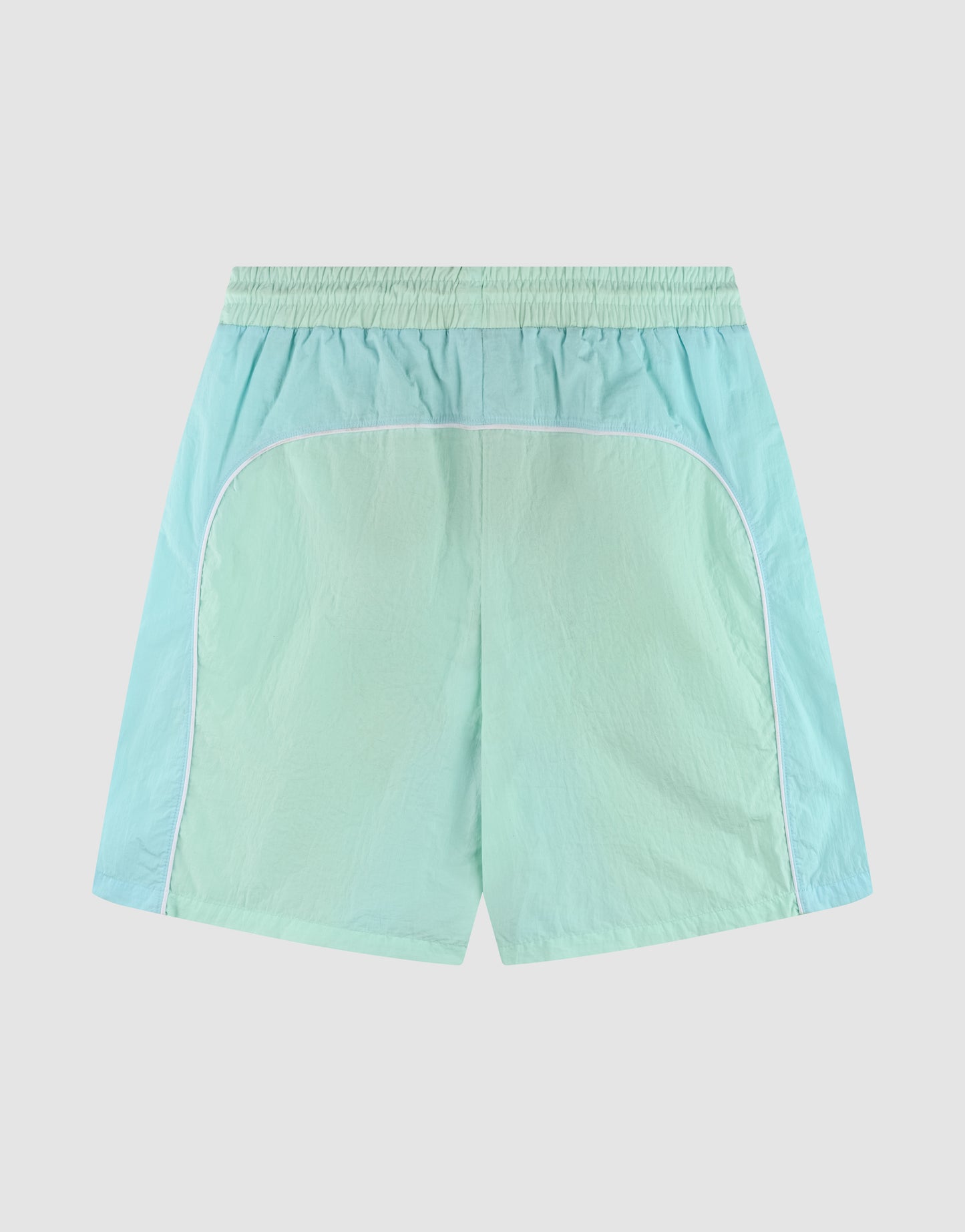 LIVE FAST DIE YOUNG Beach Shorts in light green and aqua blue, featuring an elastic waistband, white details, and a regular fit, displayed flat on a plain white background.