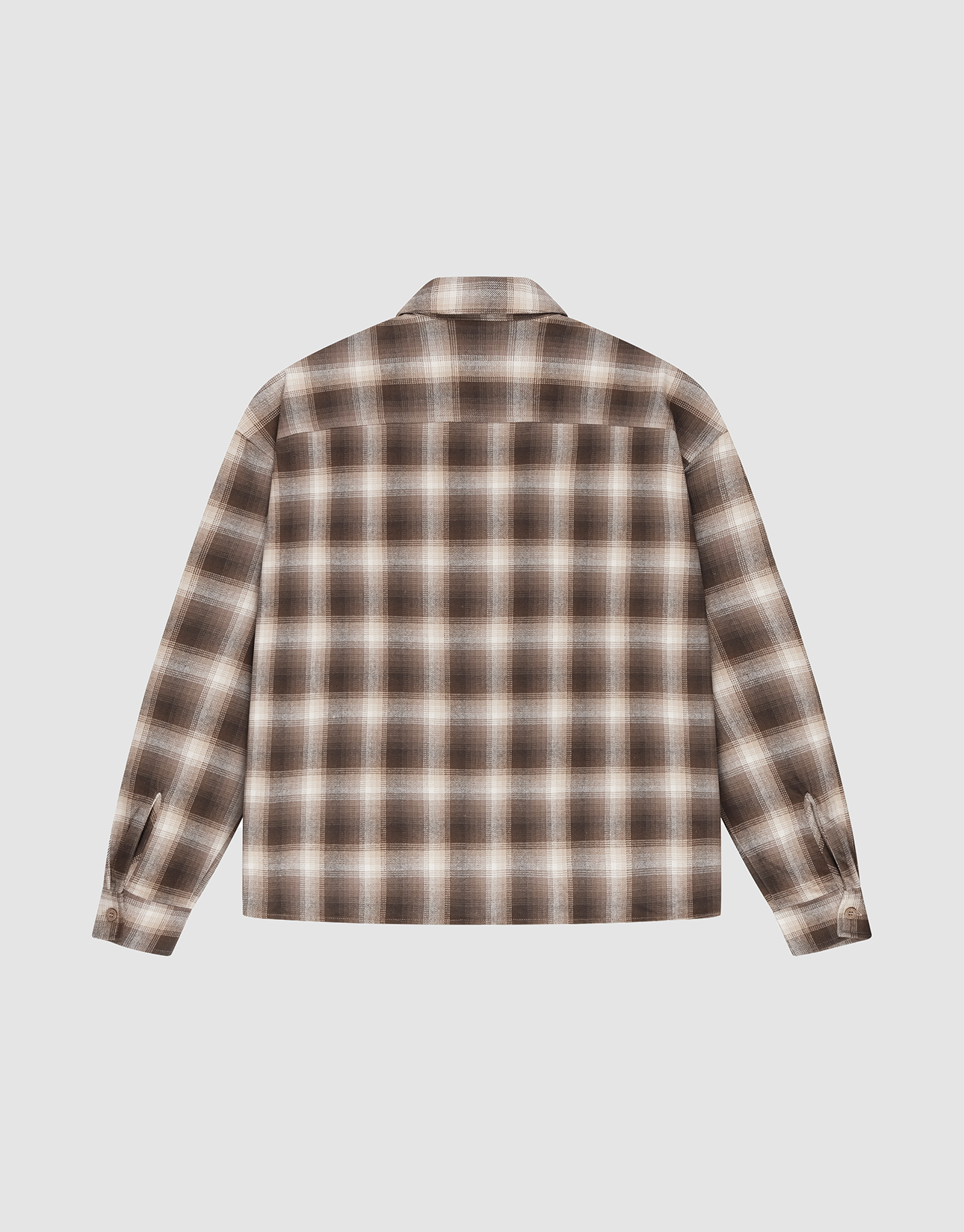 The Vintage Flannel by LIVE FAST DIE YOUNG is a brown, beige, and white plaid long-sleeve shirt with an oversize fit, straight hem, and buttoned cuffs. Crafted from 100% Baumwolle, shown laid flat on a white background.