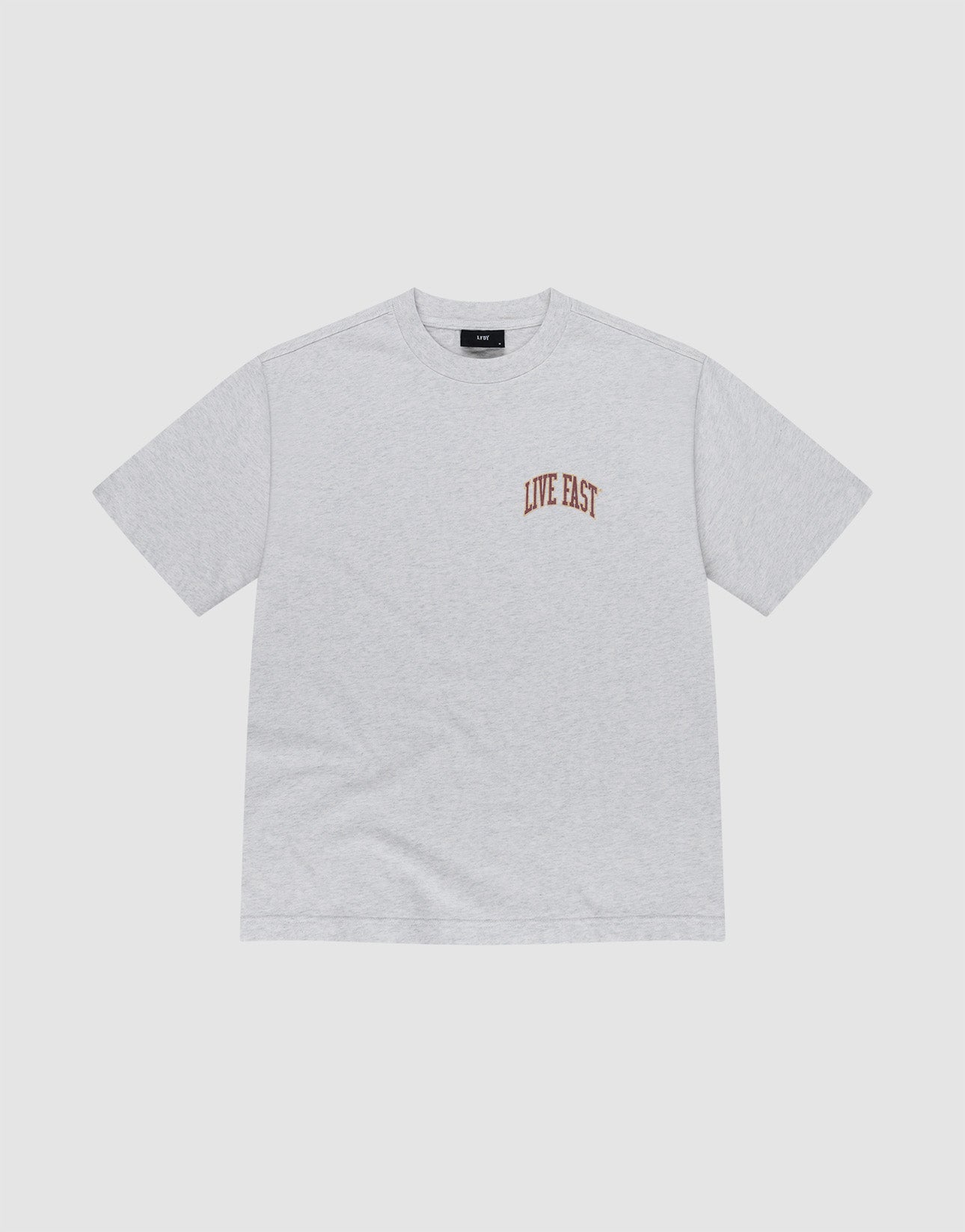 The Live Fast Amsterdam Tee by LIVE FAST DIE YOUNG is a light gray oversized short-sleeve t-shirt made from 100% cotton, featuring small brown "LIVE FAST" lettering on the left chest, shown on a white background.