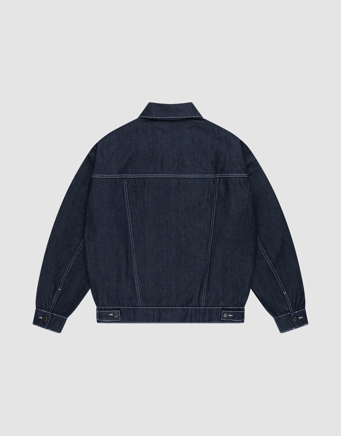 The LFDY Denim Jacket by LIVE FAST DIE YOUNG is shown from the back, crafted from 100% cotton raw denim with long sleeves, a pointed collar, visible seams, buttoned cuffs, and adjustable hem tabs. Laid flat on a plain light background.