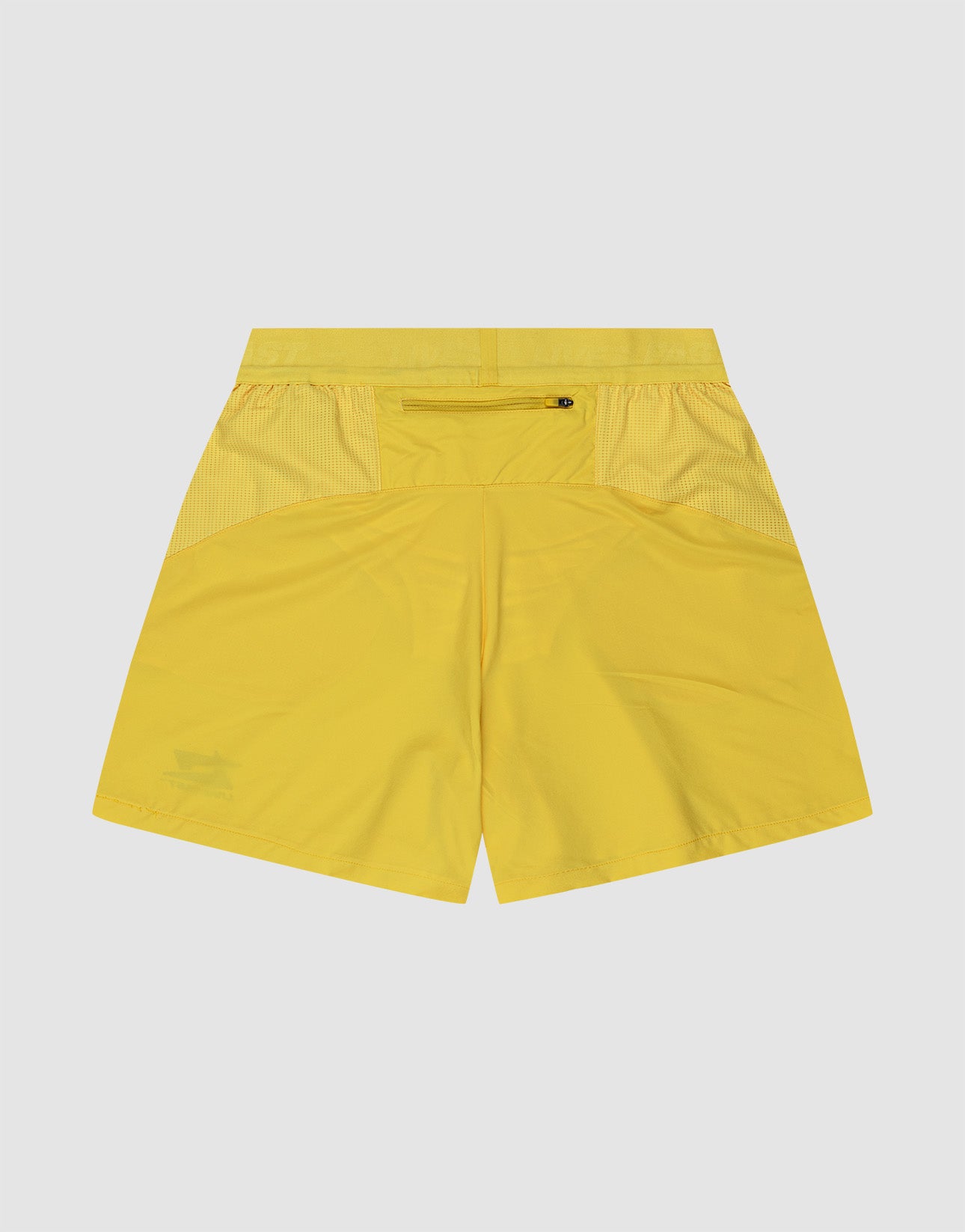 The Live Fast Performance Shorts by LIVE FAST DIE YOUNG are bright yellow with an Elastikbund waistband, zipper pocket, upper side mesh panels, relaxed fit, and lightweight fabric. Simple design shown from the back.