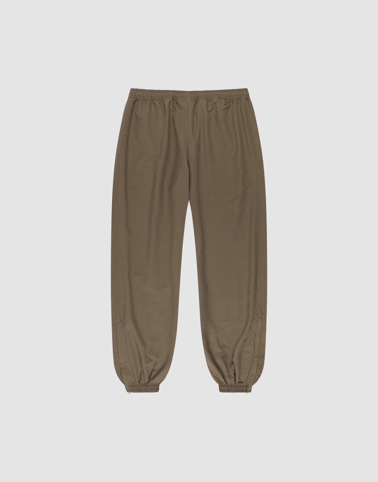 The LFDY Trackpants by LIVE FAST DIE YOUNG are olive green jogger-style pants with an elastic waistband and cuffs, made from polyester in a regular fit, shown on a plain white background.