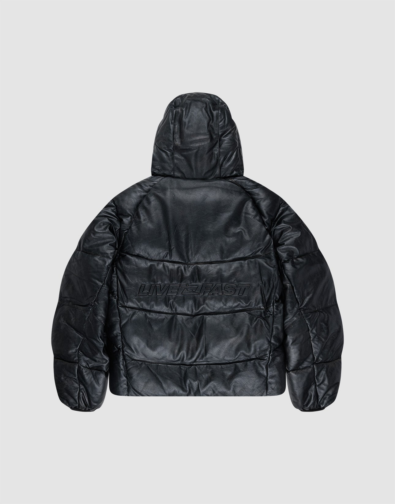 The Live Fast Leather Puffer Jacket by LIVE FAST DIE YOUNG is shown from the back, featuring an embossed Live Fast logo embroidered in black on a plain light gray background.