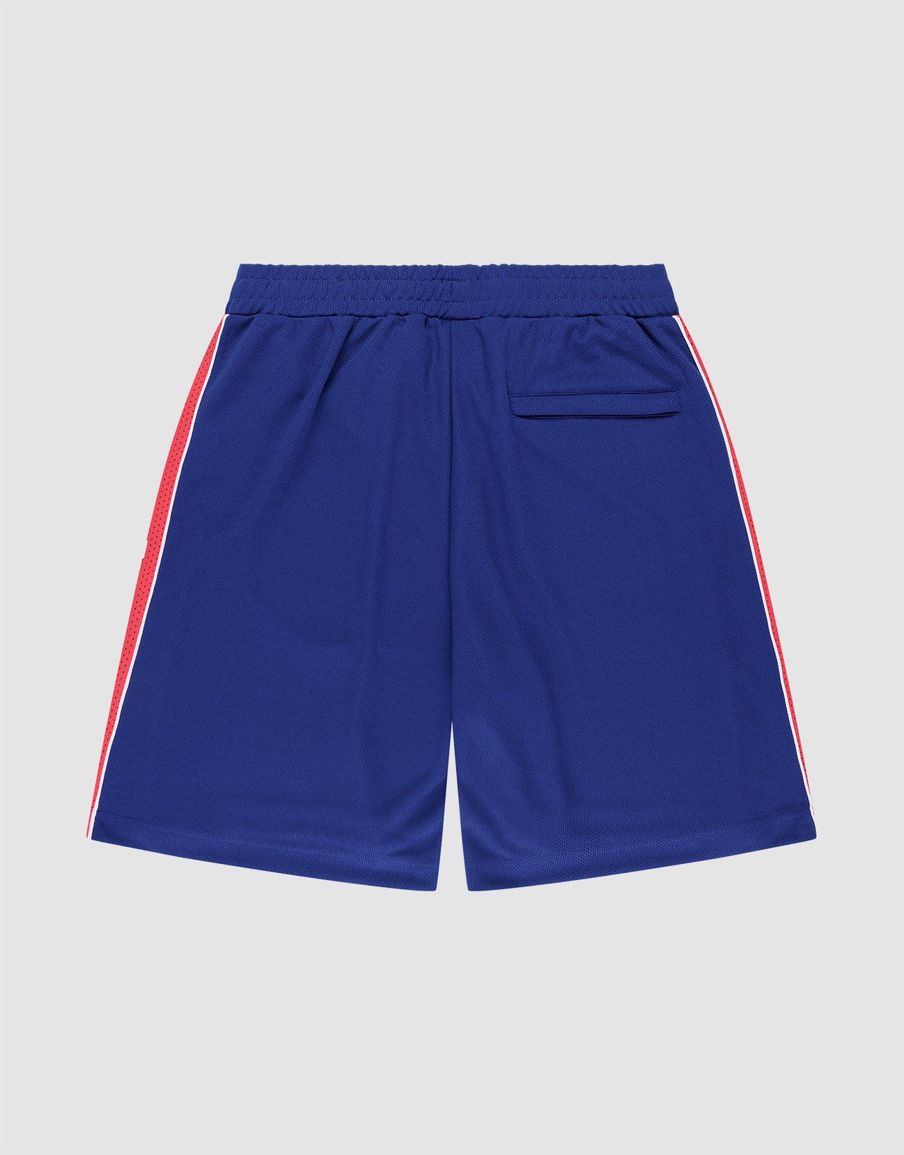 LIVE FAST DIE YOUNG Striped Mesh Shorts in blue, featuring an oversize fit, elastic waistband, small back pocket on the right, and red and white side stripes. Displayed flat on a light gray background.