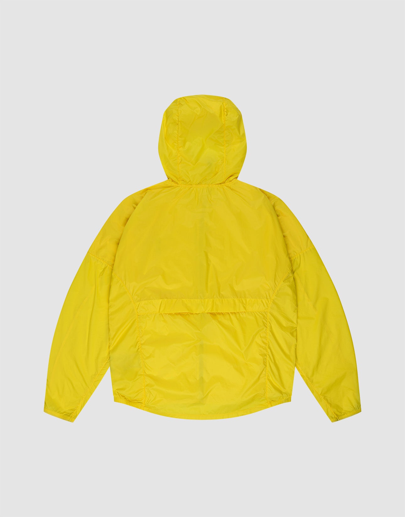 The LIVE FAST DIE YOUNG Live Fast Performance Running Jacket in bright yellow is shown from the back against a white background, featuring long sleeves, regular fit, and a very lightweight outer material for comfort.
