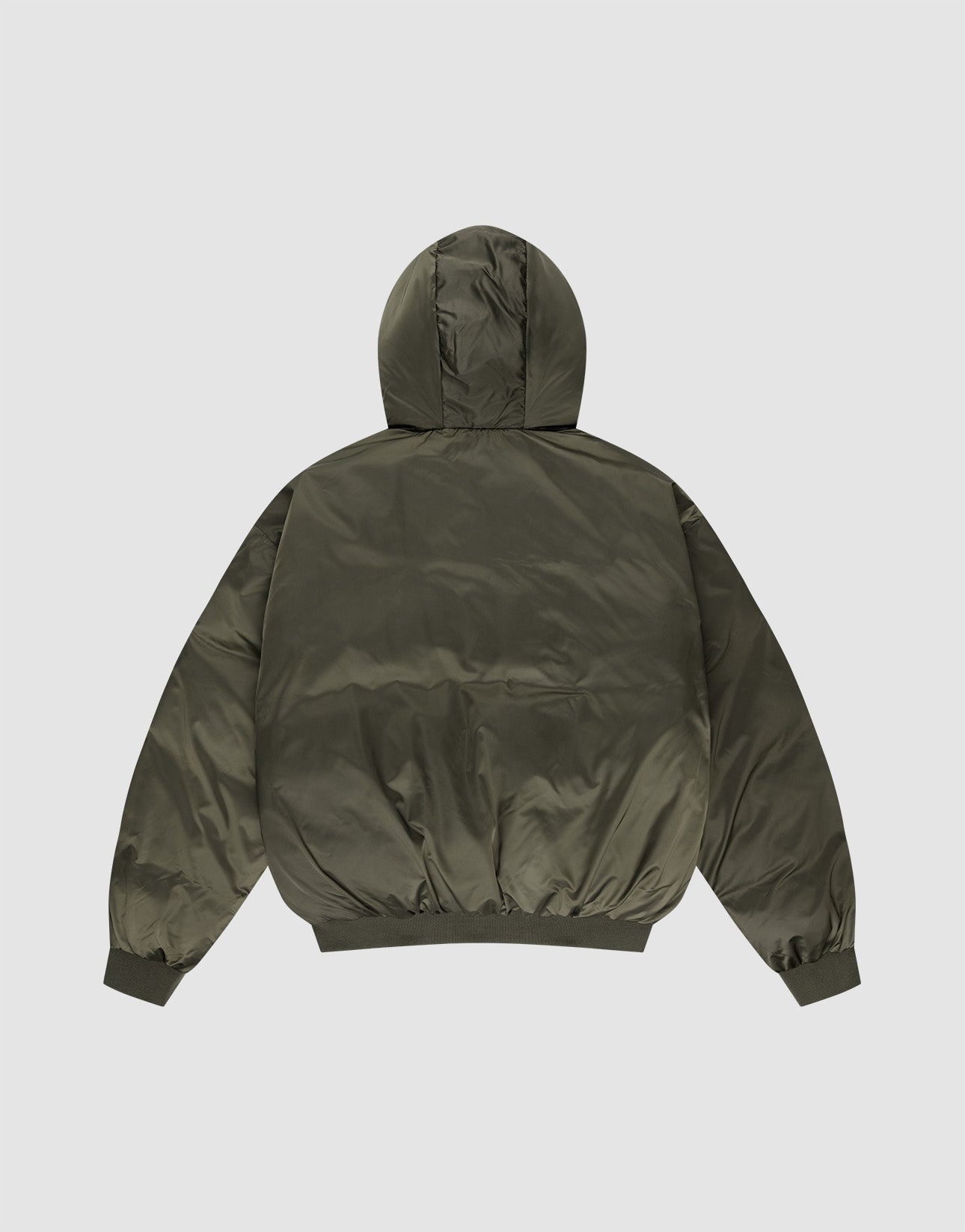 The LFDY Winter Bomber Jacket by LIVE FAST DIE YOUNG is an olive green, oversize fit puffer with a hood and cords, long sleeves, elastic cuffs, and a fitted waistband. Shown from the back against a light gray background.